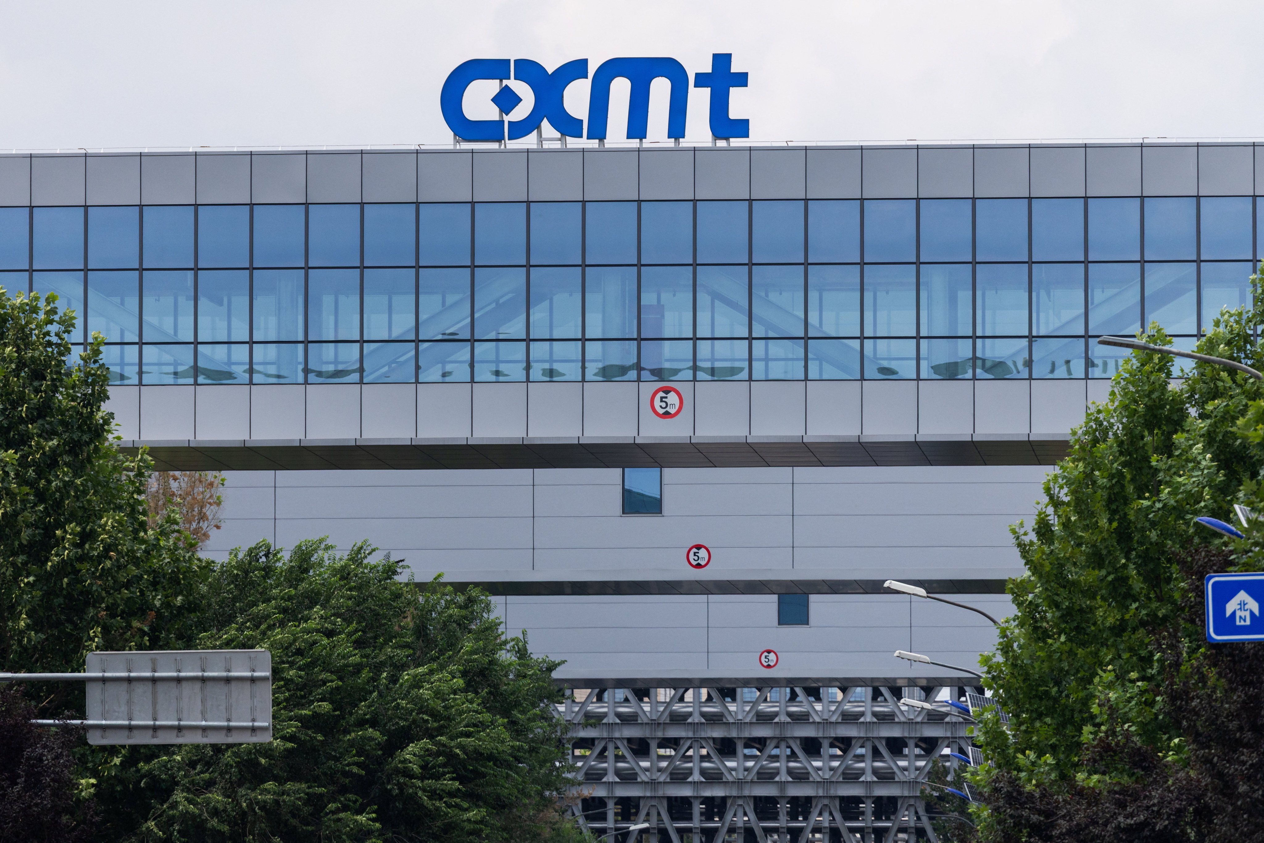 The logo of China’s top memory chipmaker, CXMT, appears on the facade of one of the company’s production facilities, in Beijing. Photo: Reuters