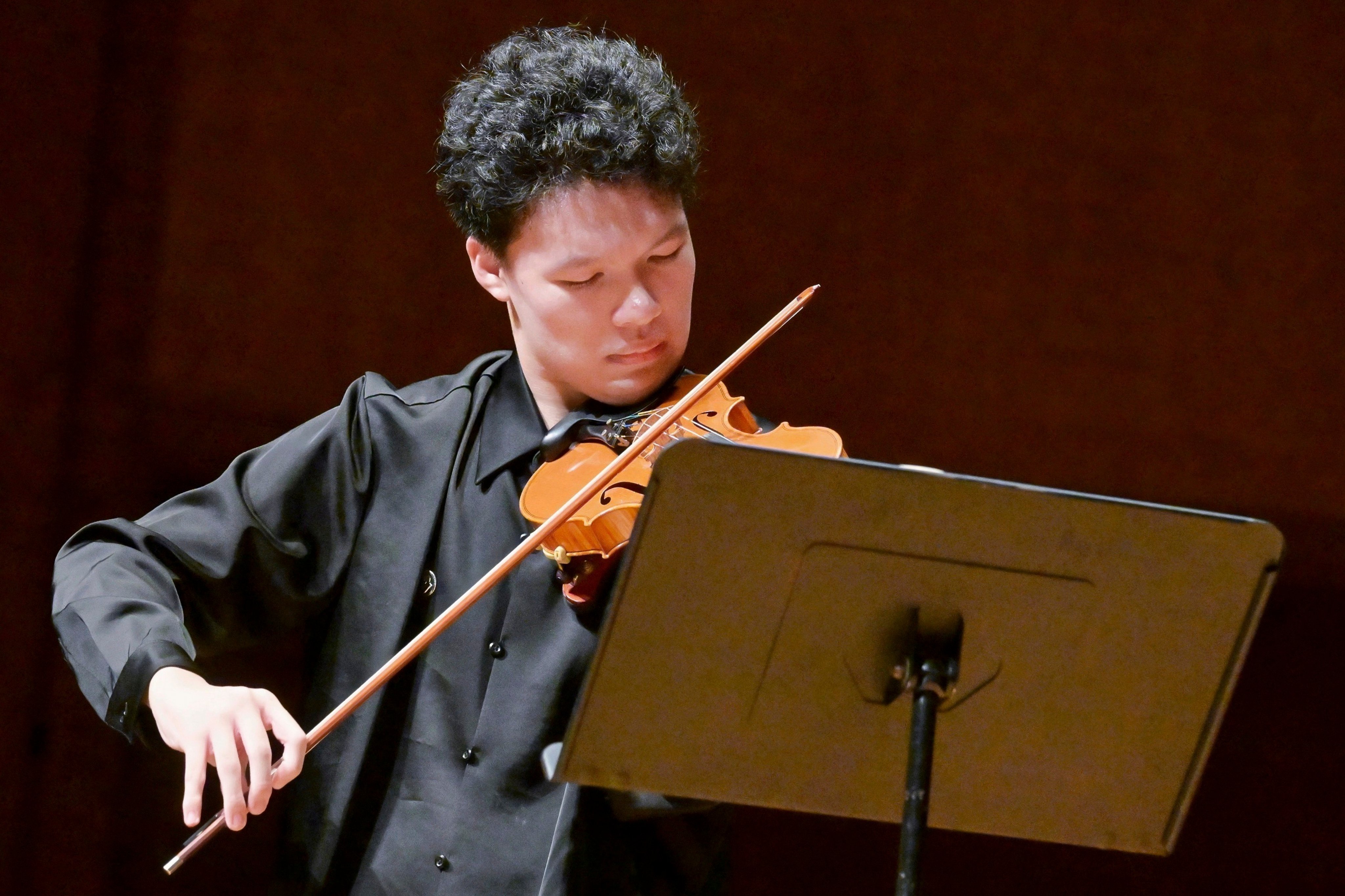 Chinese violinist Zhang Aozhe performs during “The Magic of Violin” concert at Hong Kong City Hall Concert Hall on August 25, 2026. Photo: Hong Kong International Young Musicians Competition Foundation