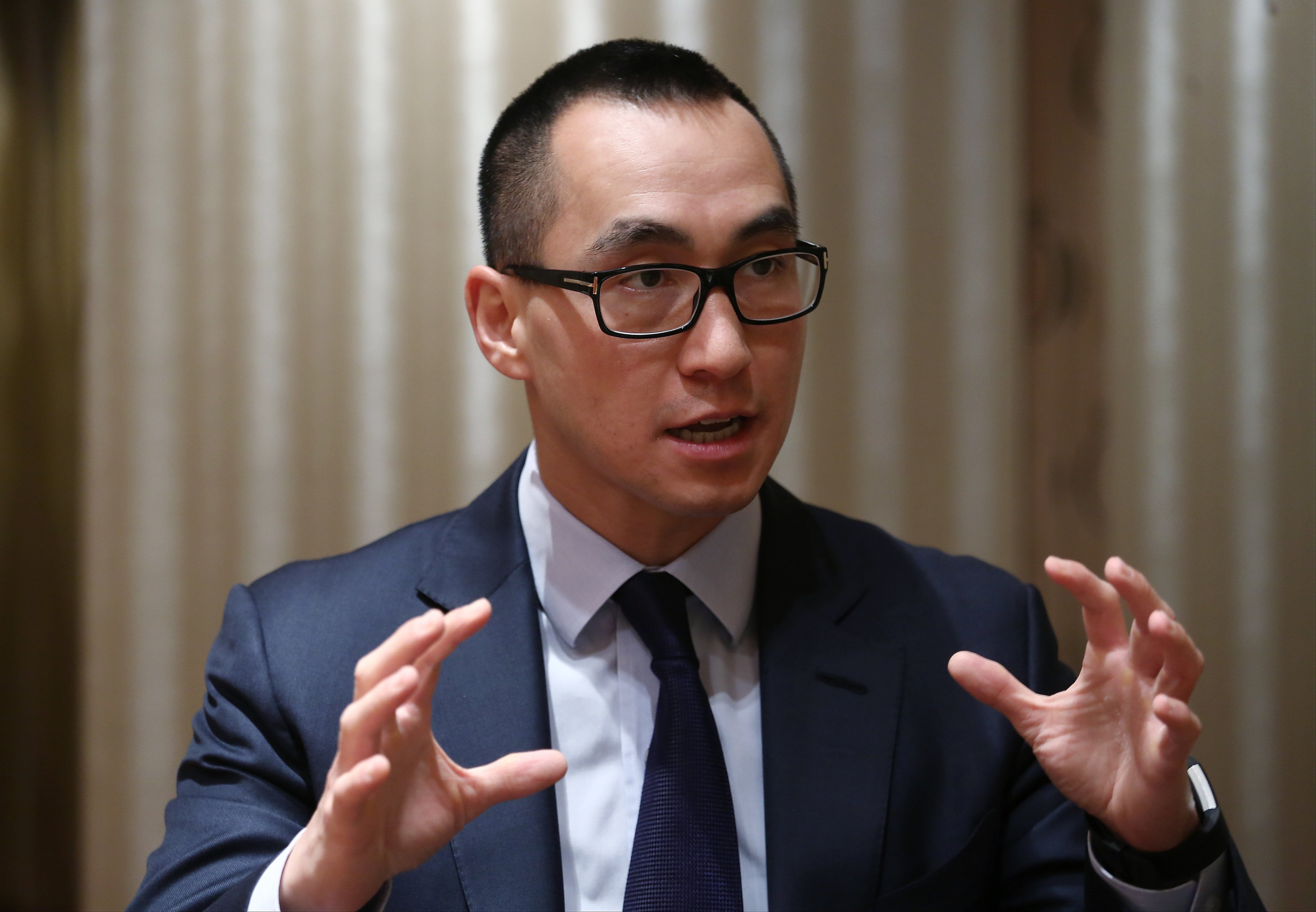 Lawrence Ho Yau-lung, chairman of Melco Resort and Entertainment, speaks at the InterContinental Hong Kong in Tsim Sha Tsui. Photo: Jonathan Wong