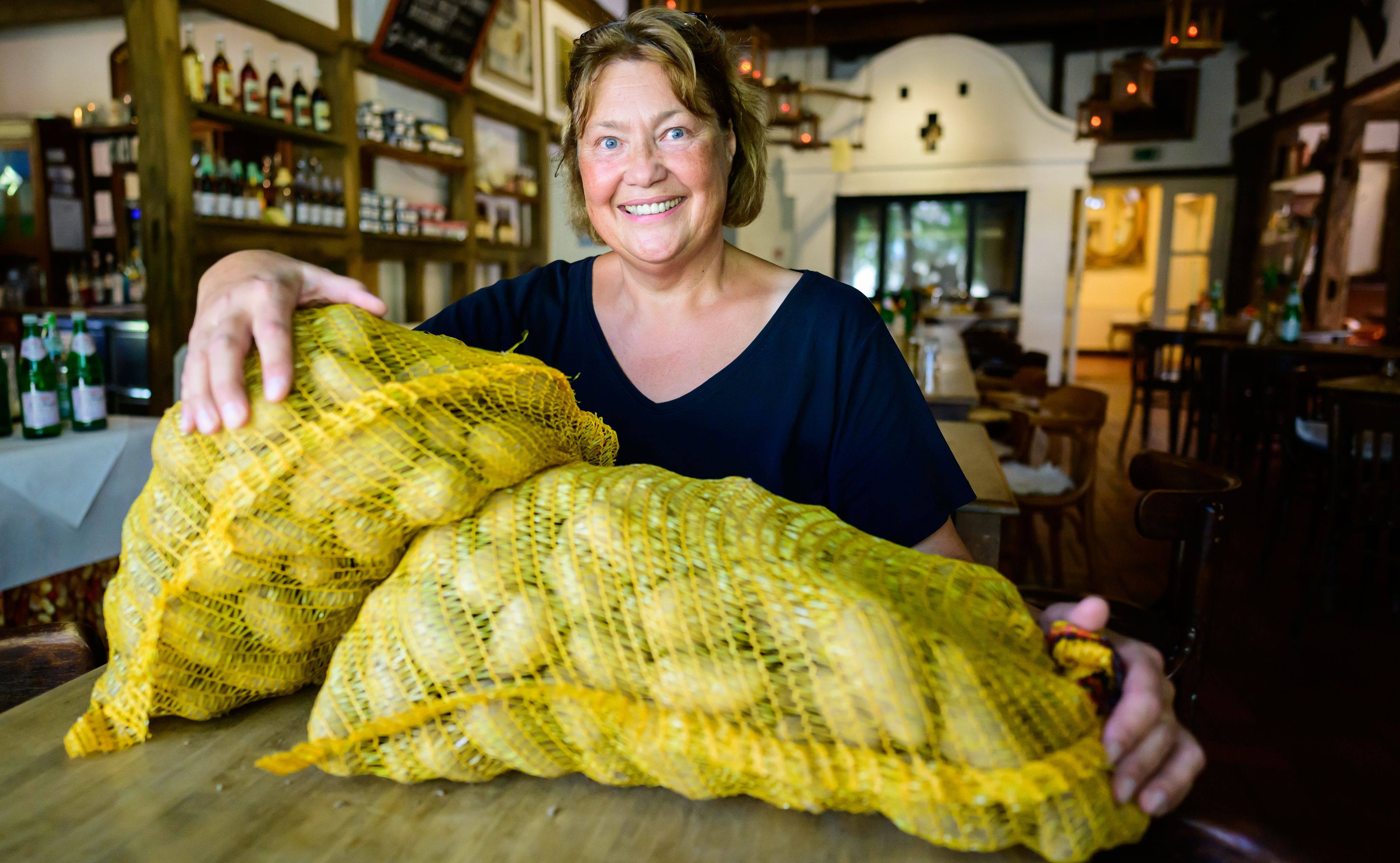 Sylvia Methfessel, the right-hand woman of Potato Hotel owner Olaf Stehr, says young people from all over the world visit the German hotel. Photo: Philipp Schulze/dpa