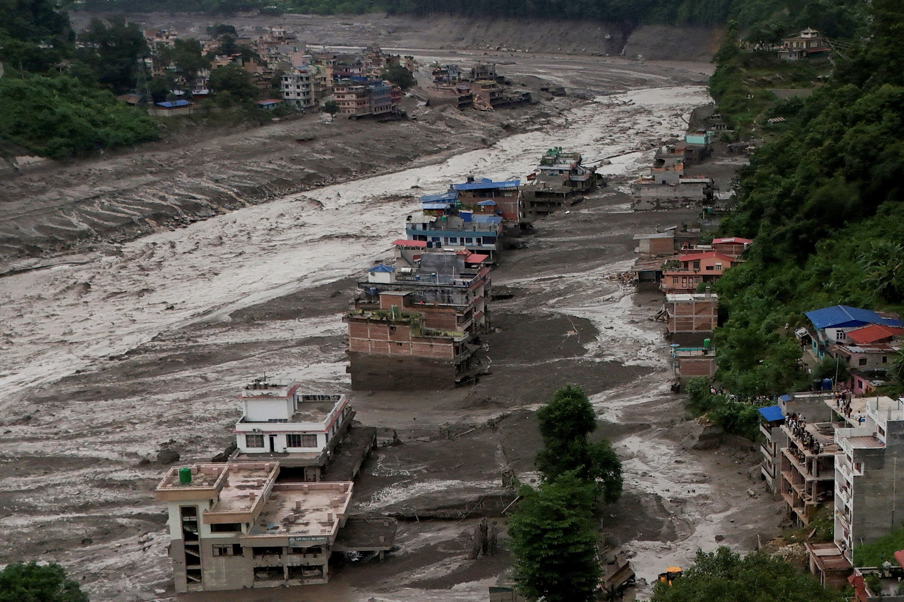 Mud from the flash flood covers properties at Trishuli in Nuwakot district, Nepal, on Wednesday. Photo: Reuters