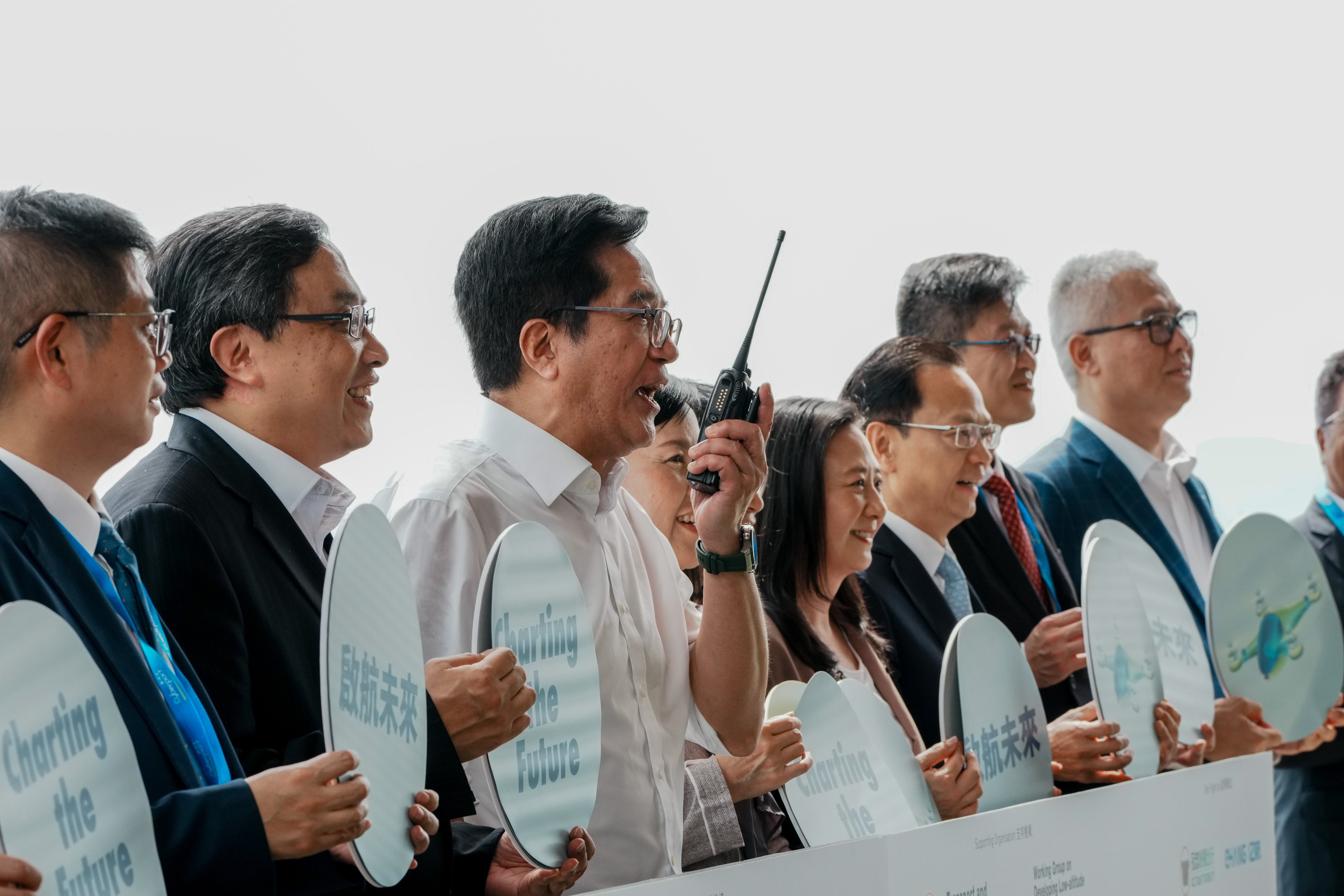 Deputy Financial Secretary Michael Wong (third left) was among the dignitaries watching the maiden flight. Photo: Dickson Lee