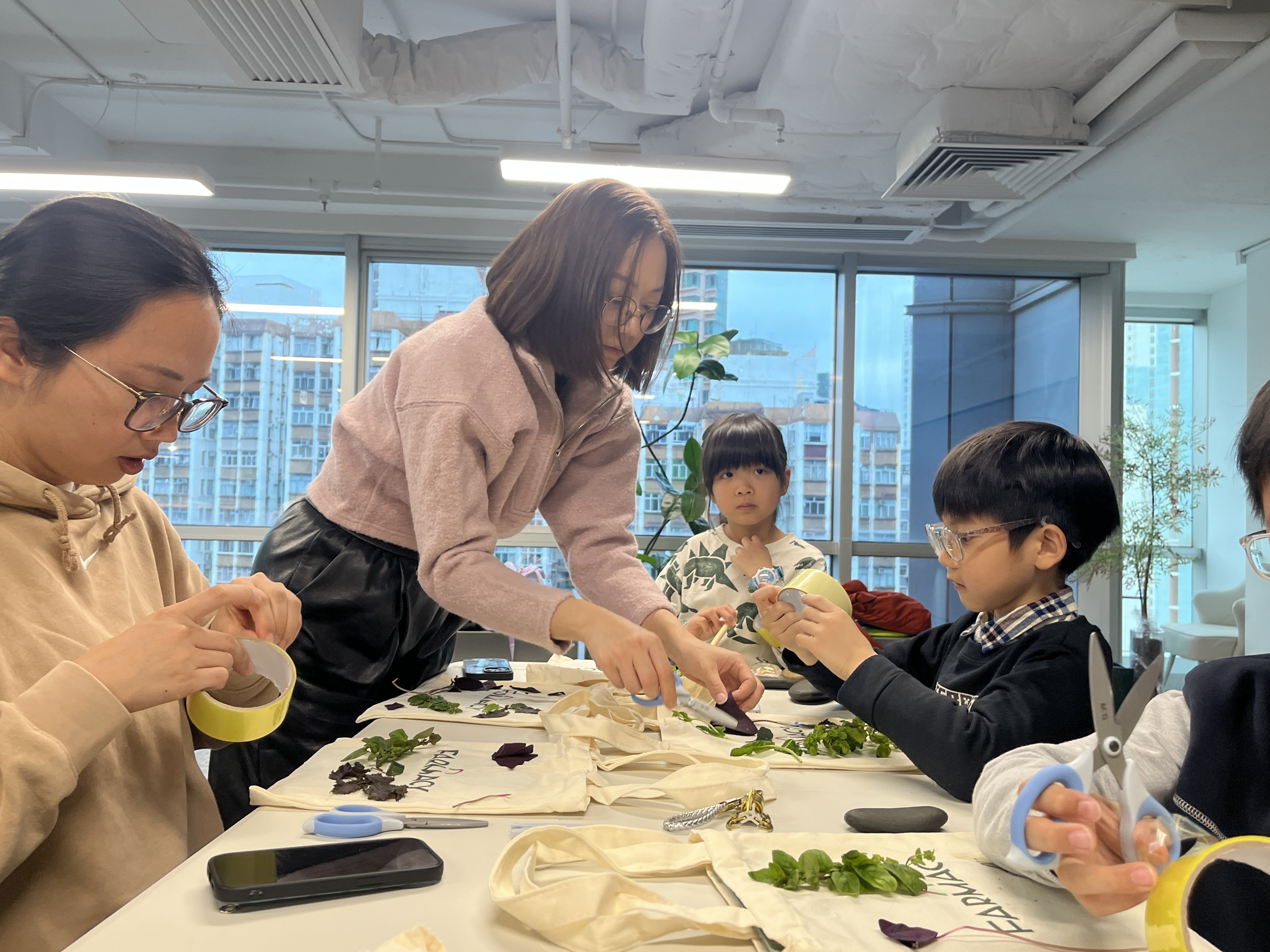 Visitors take part in crafting activities during an urban farming experience day at Farmacy in Shau Kei Wan, Hong Kong. Photo: courtesy of Farmacy