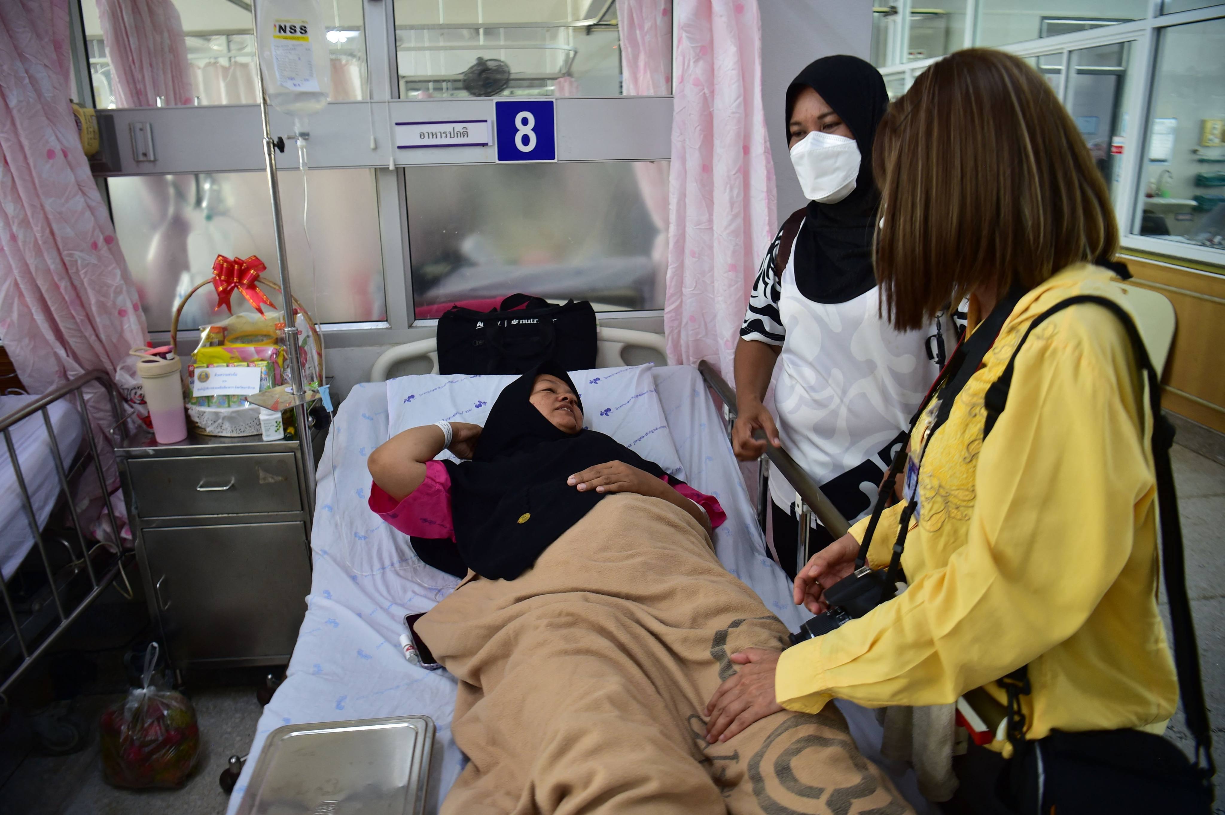A woman injured in a roadside blast recuperates at a hospital in the southern Thai province of Narathiwat on Sunday. Photo: AFP