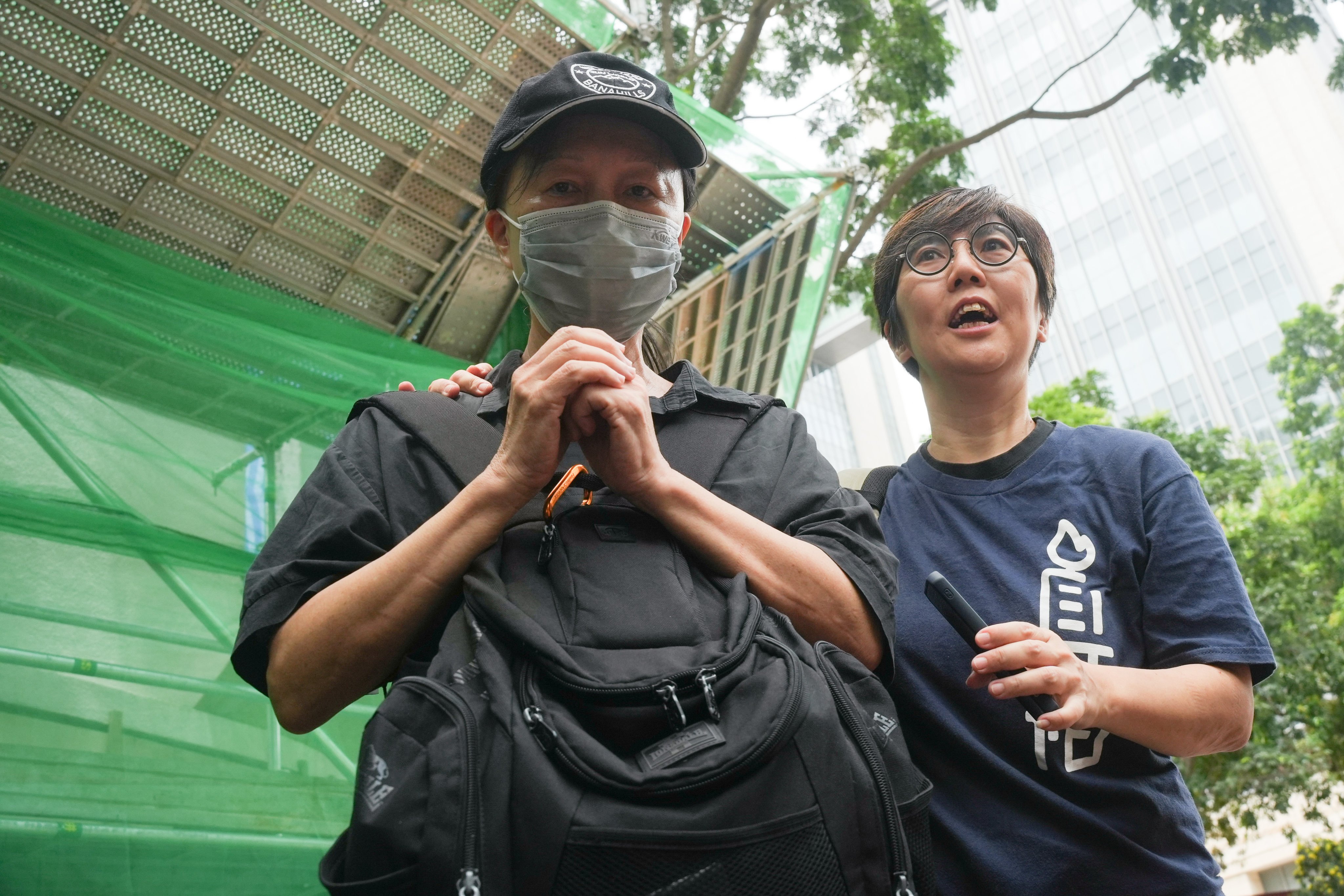 Mrs Chow (left), the mother of Chow Hang-tung, speaks to the media outside the court building. Photo: Sun Yeung
