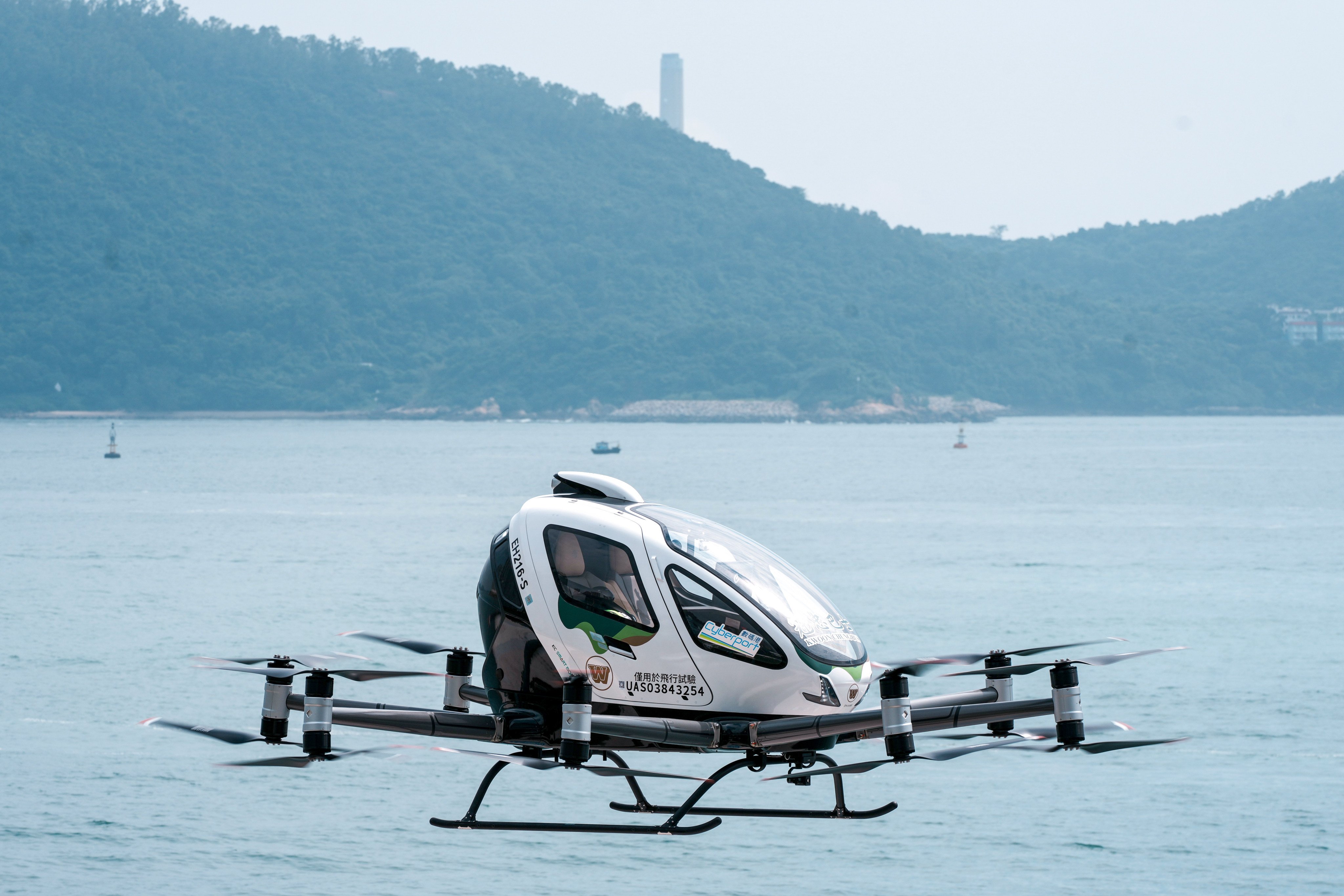 EHang’s flagship model, the EH216-S, carried a robot and conducted multiple sorties along predetermined routes at Cyberport. Photo: Dickson Lee