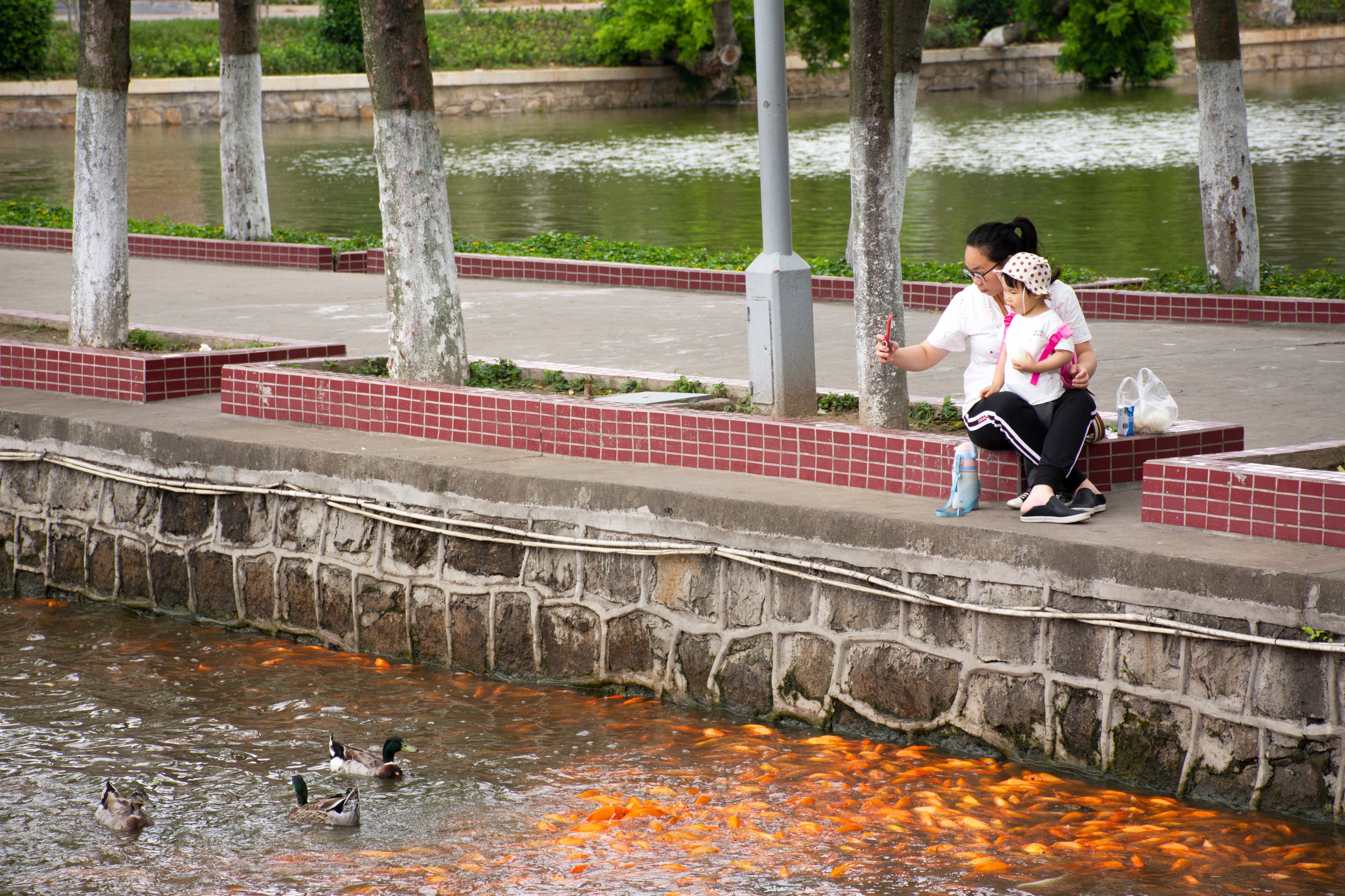 A woman and child at Zhongshan Park in Guangdong province. Photo: Shutterstock Images