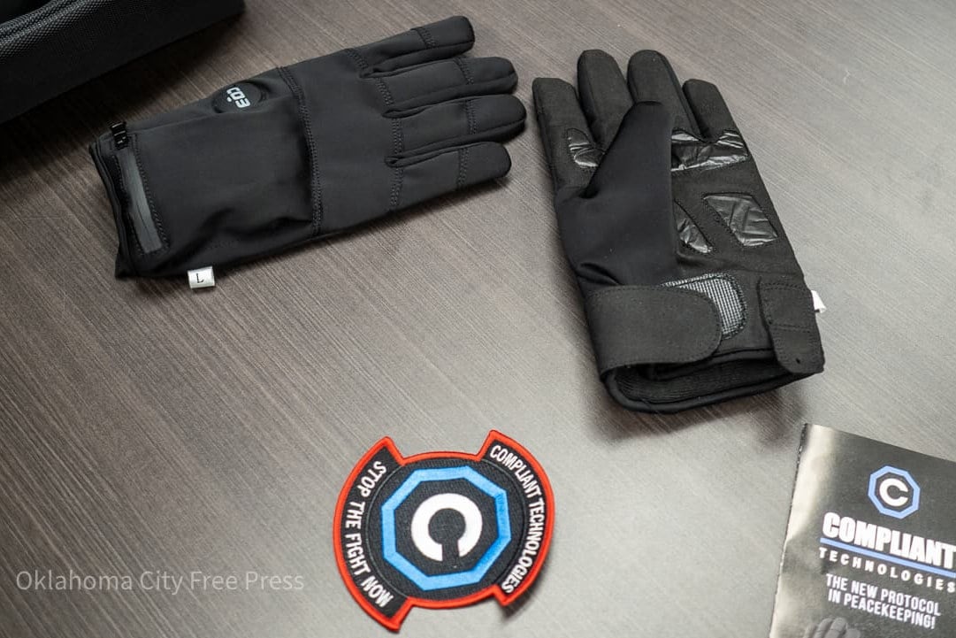 A pair of electric shock gloves developed by Compliant Technologies. Photo: Oklahoma City Free Press via AP