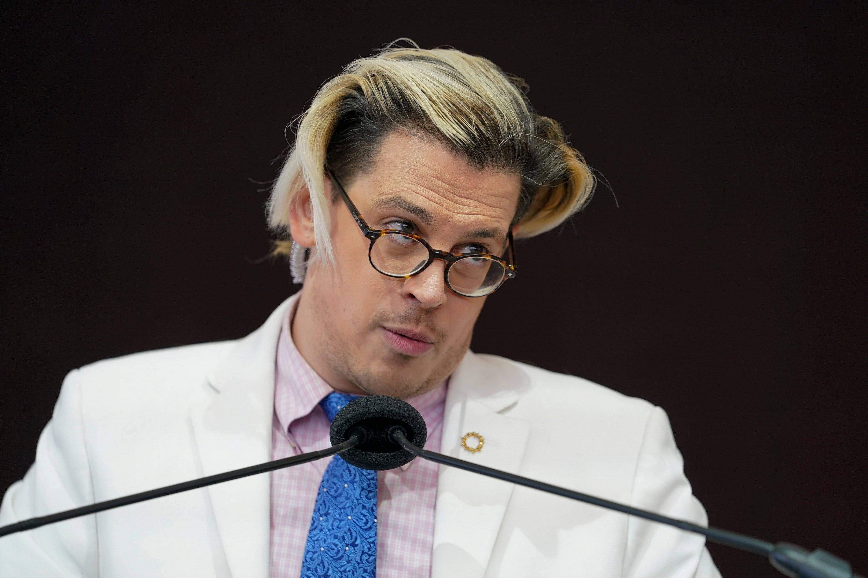 Activist Milo Yiannopoulos speaks during a rally in Baltimore in November 2021. Photo: AP