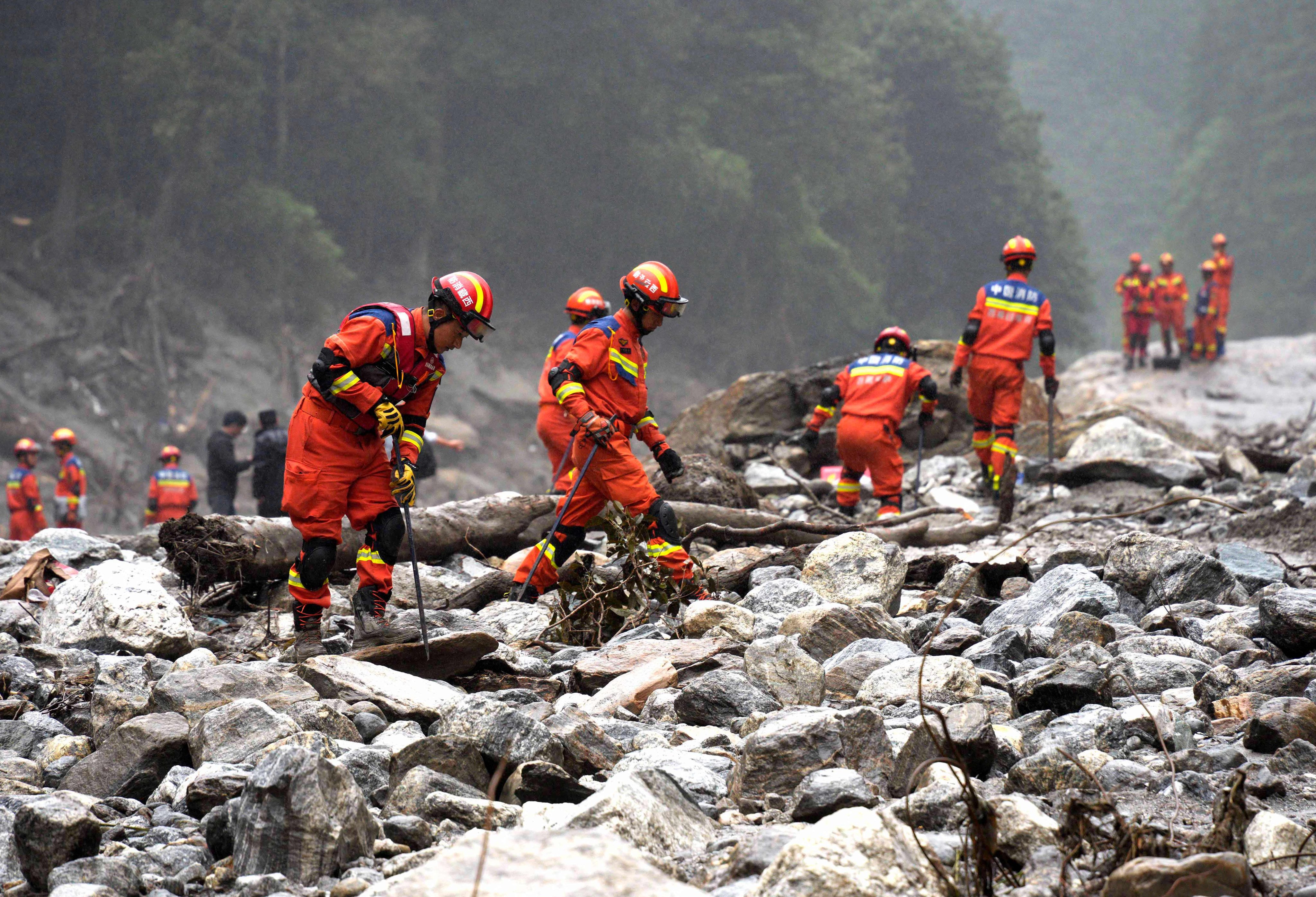 Search and rescue operations are carried out near the destroyed Gyirong Port, Tibet, on August 29. Photo: AFP
