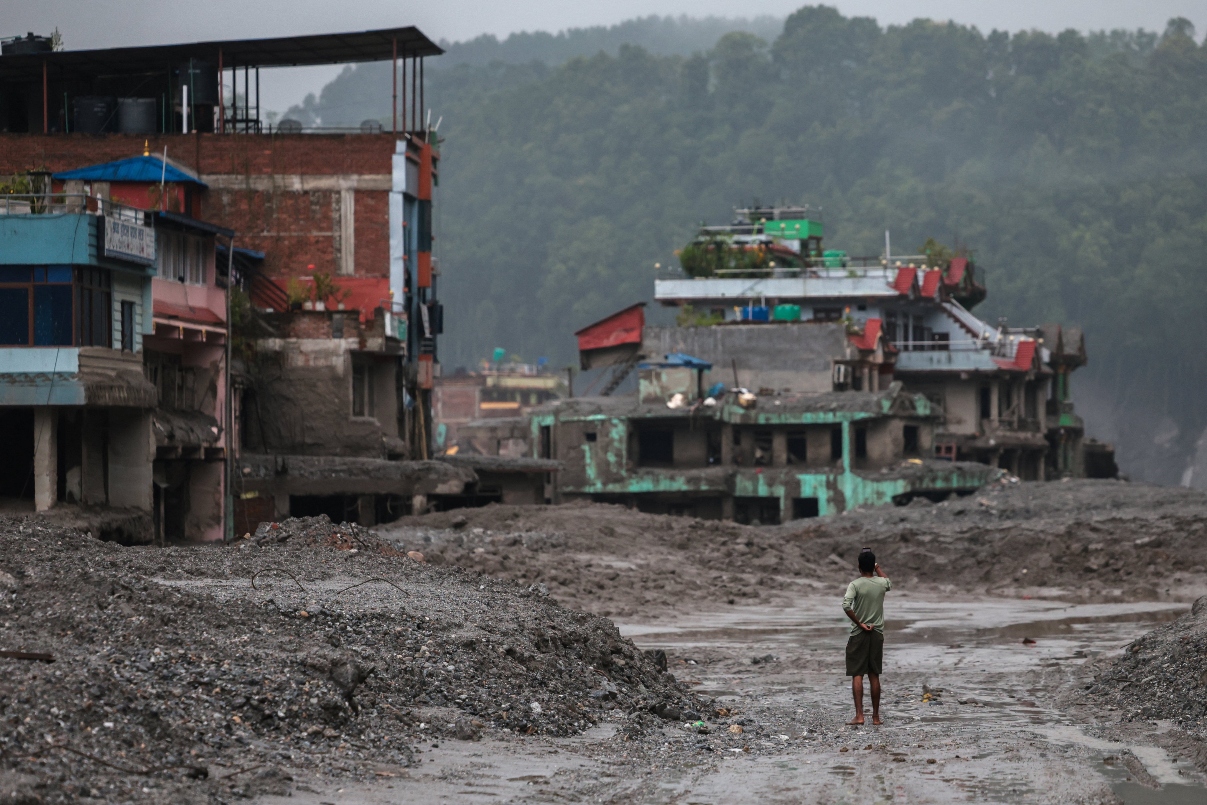 Hong Kong will set aside HK$50 million from its Disaster Relief Fund for emergency projects after deadly flooding along the Nepal-Tibet border. Photo: Reuters