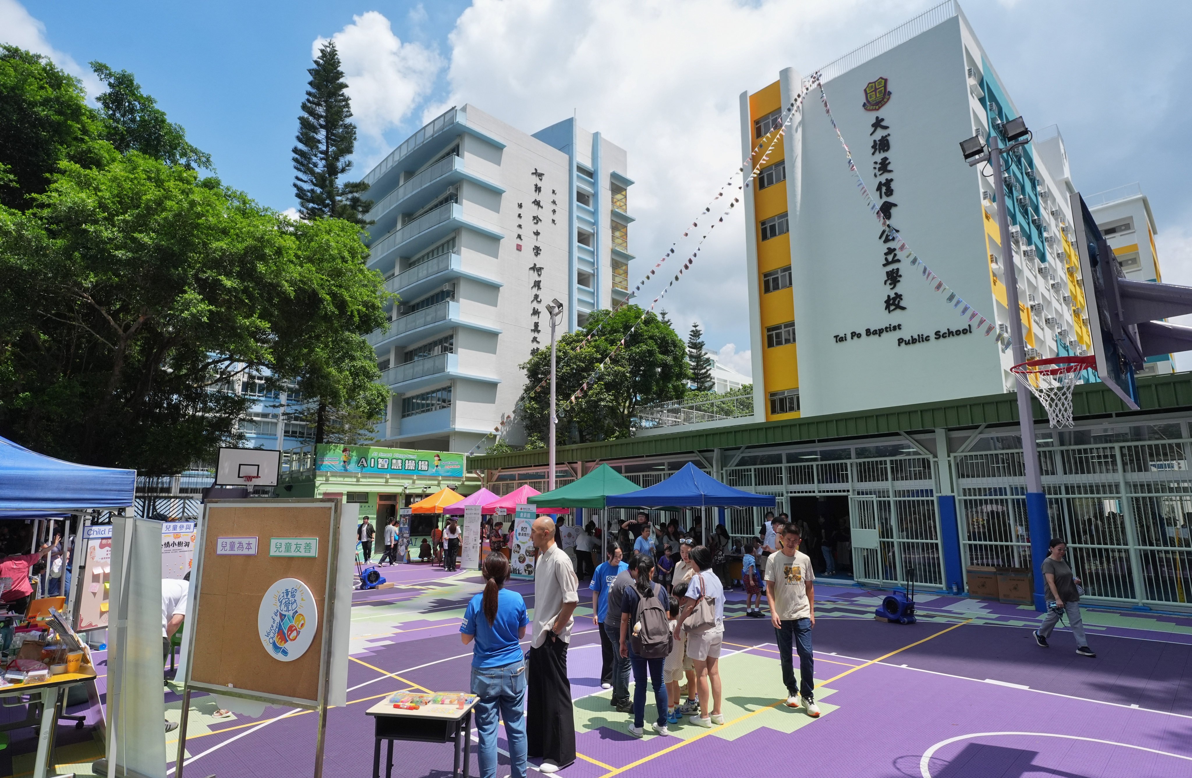 Pupils and teachers at Tai Po Baptist Public School visit the new campus at Fu Shin Estate after months of temporary classes following the Wang Fuk Court fire. Photo: Elson Li