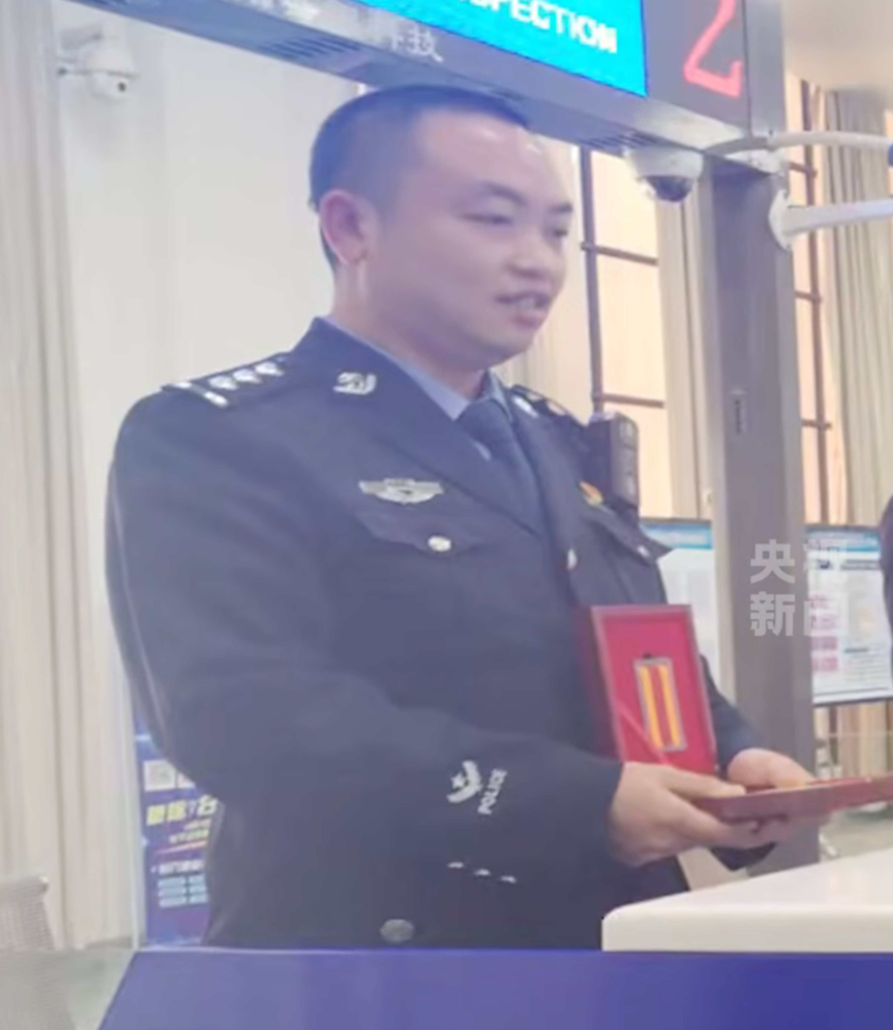 The officer has been identified as Huang Peng. Photo: CCTV