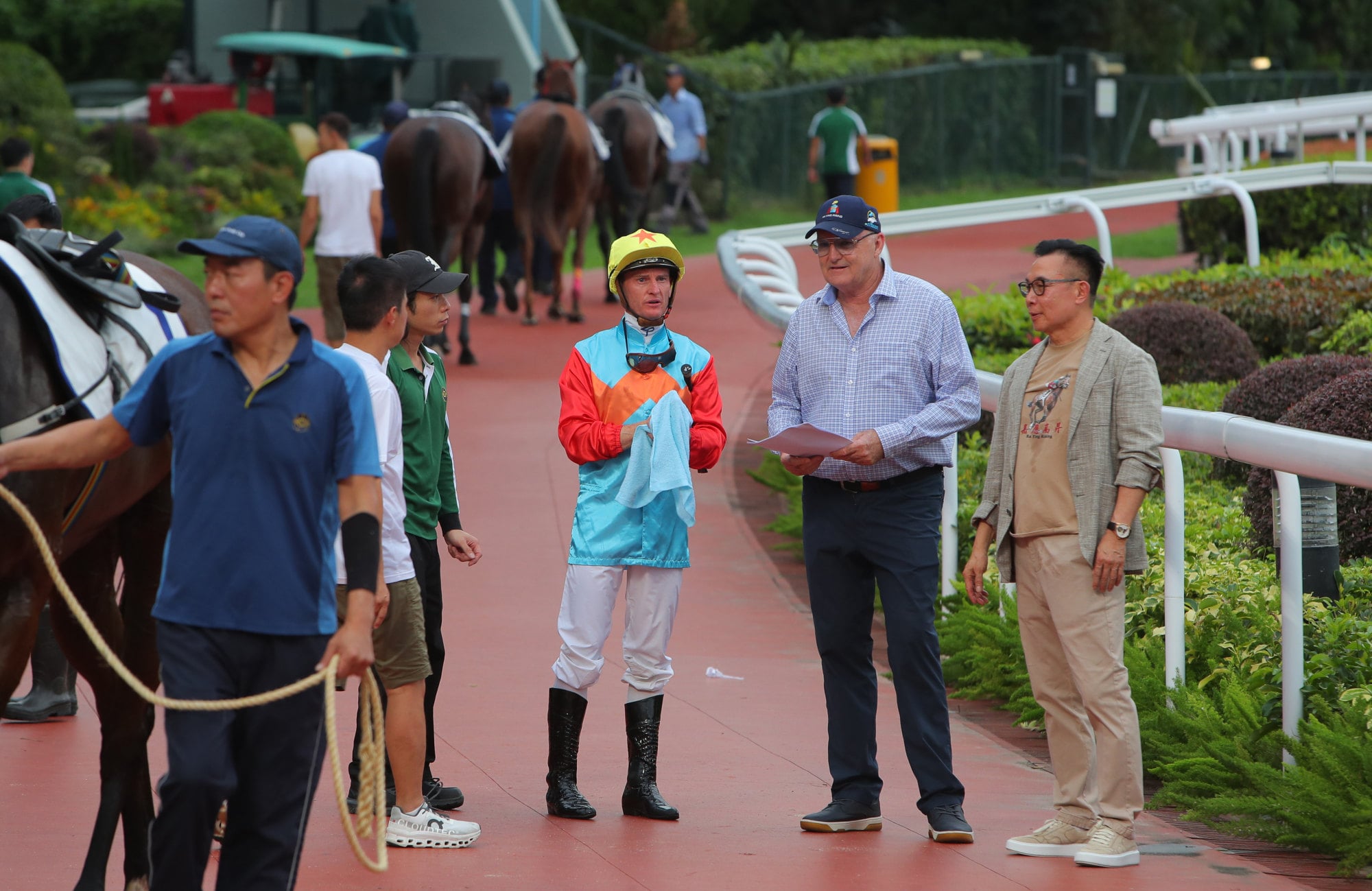 Jockey Zac Purton, trainer David Hayes and owner Leung Shek-kong debrief after Ka Ying Rising’s trial.