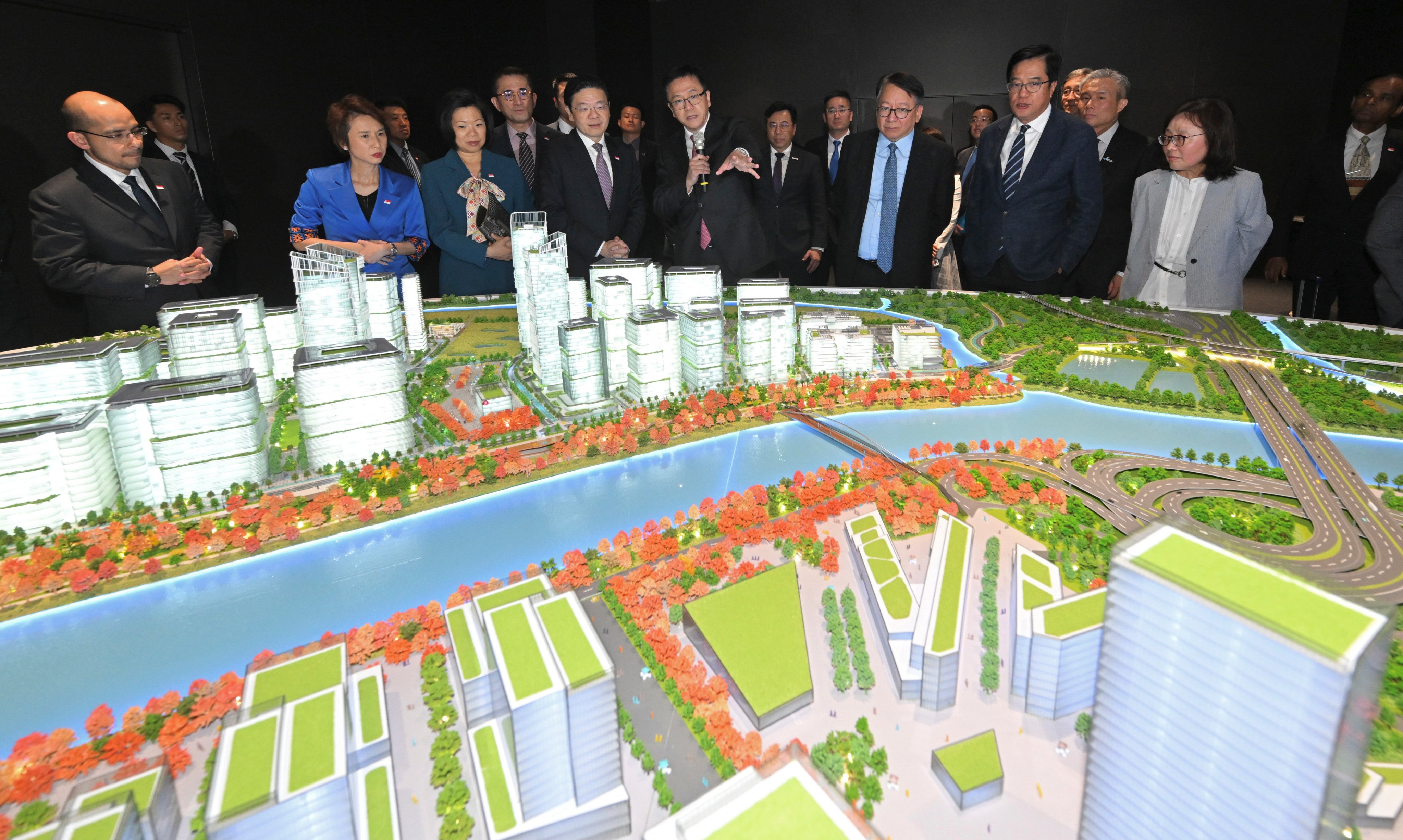 Singapore Prime Minister Lawrence Wong (fourth from left, front row) visited the Hong Kong park of the Hetao Shenzhen-Hong Kong Science and Technology Innovation Cooperation Zone in March. Photo: ISD