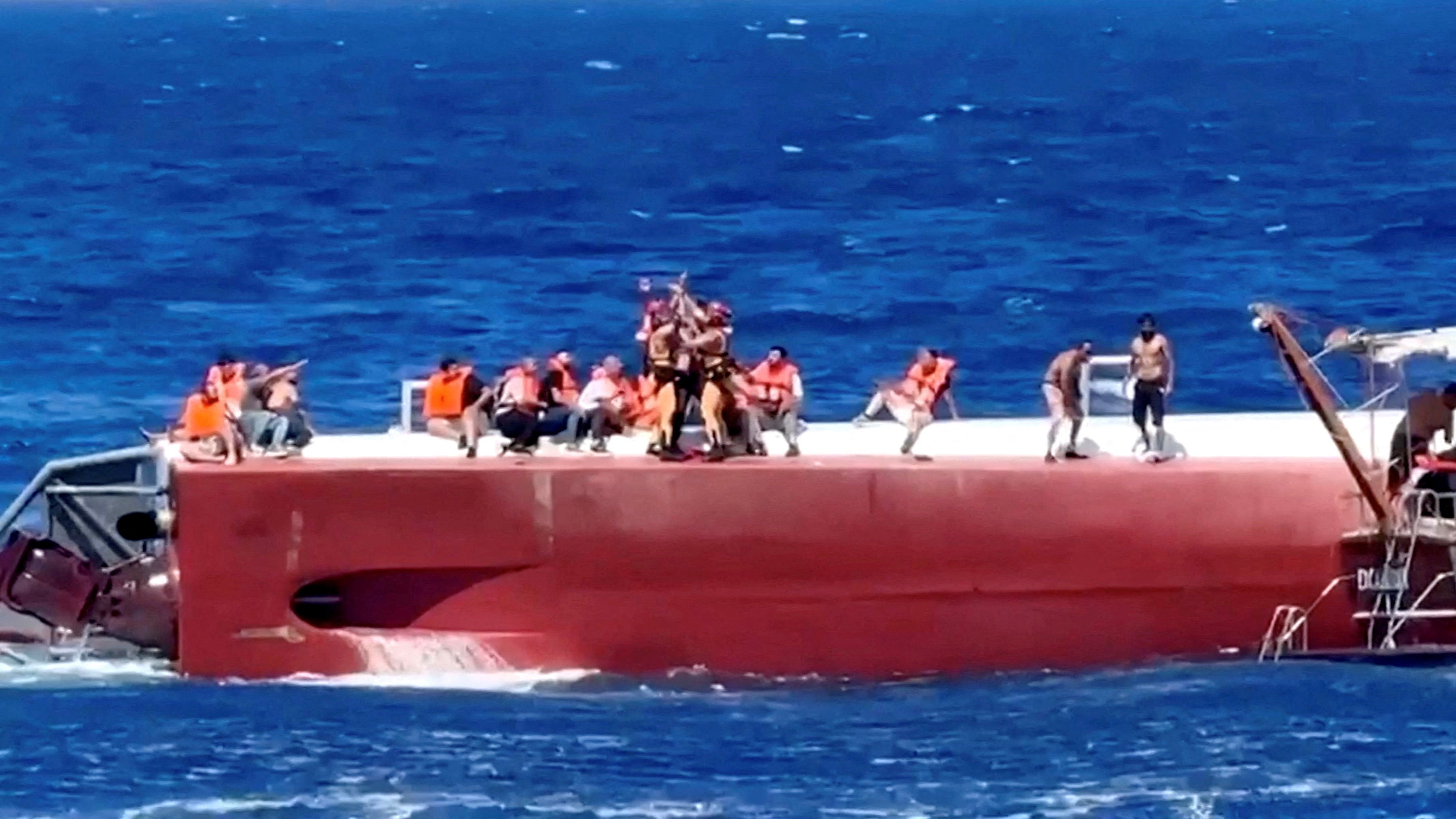 A passenger being rescued off the ferry that capsized off the coast of Northern Cyprus. Photo: Reuters TV