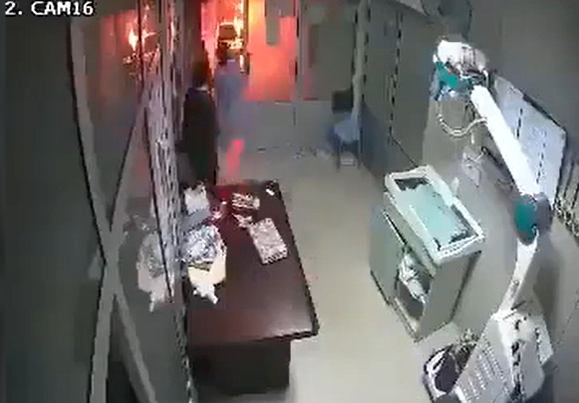 Nurse Razia Noreen (right) is seen on CCTV rushing into the burning nursery to rescue an infant. Photo: Handout