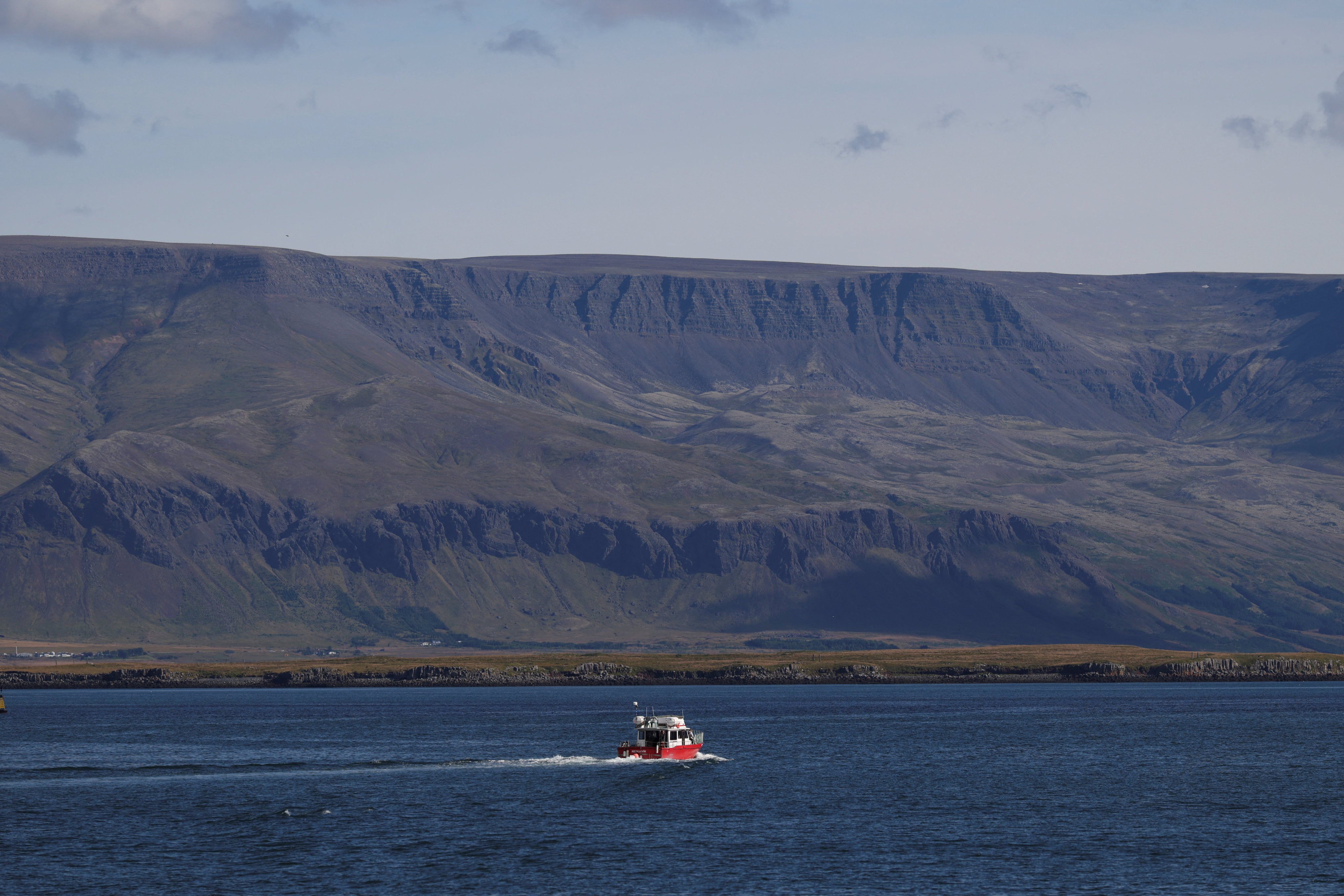 A boat leaves the harbour in Reykjavik, Iceland, after voters rejected a proposal to restart European Union accession talks in a nationwide referendum. Photo: Reuters