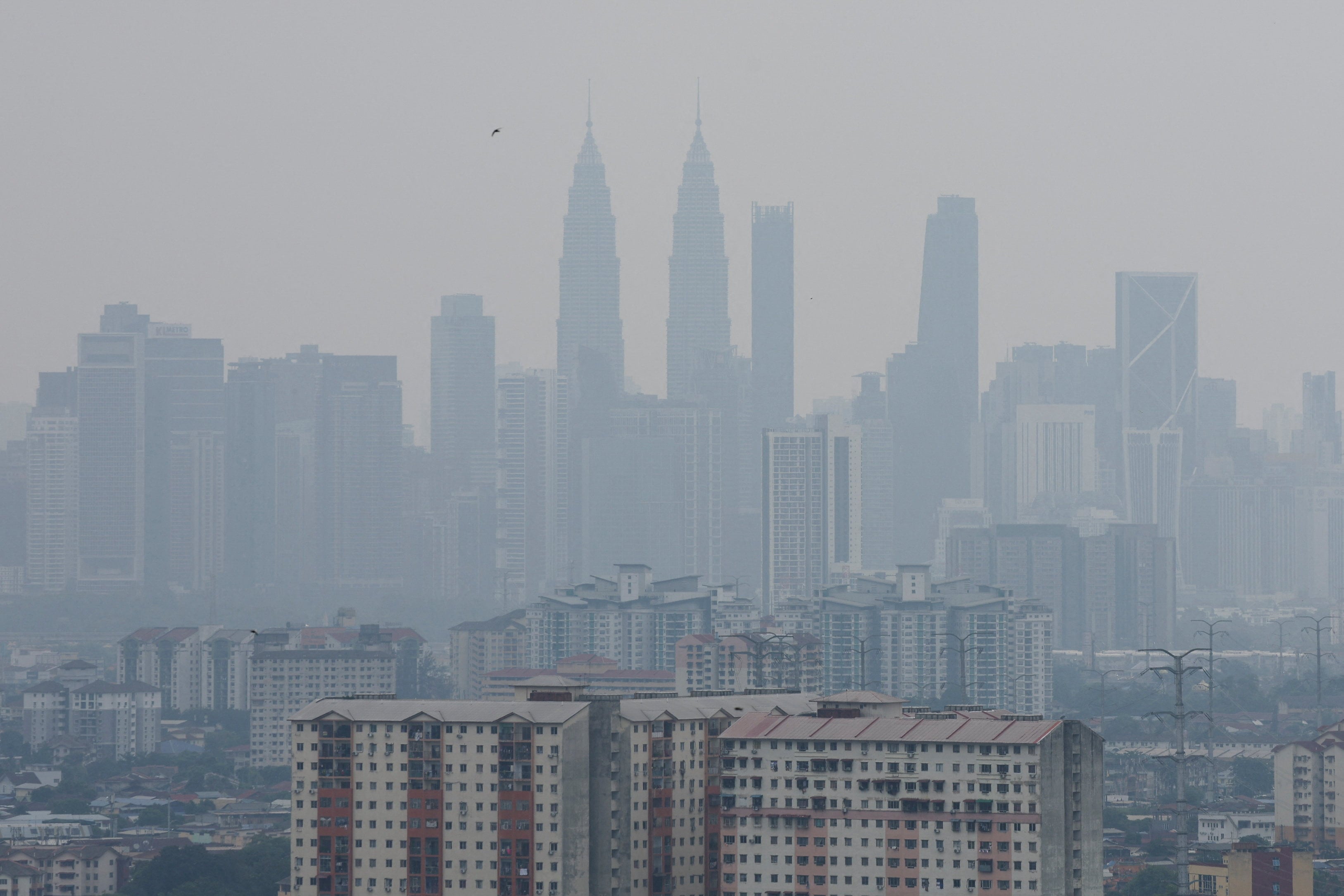 The skyline of Malaysia’s Kuala Lumpur is seen shrouded in haze from regional wildfires on Wednesday. Photo: Reuters