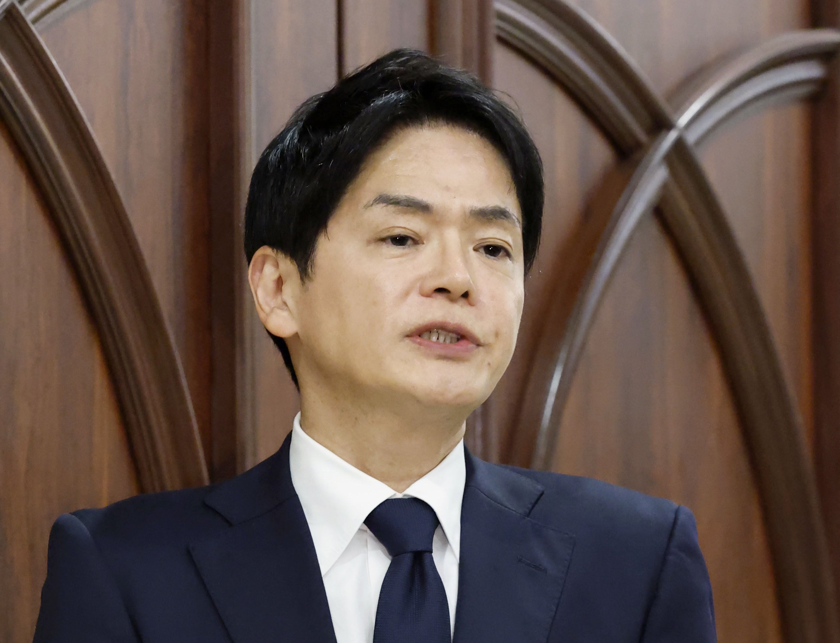 Former Yokohama mayor Takeharu Yamanaka speaks to reporters following a meeting with supporters on Friday. Photo: Kyodo