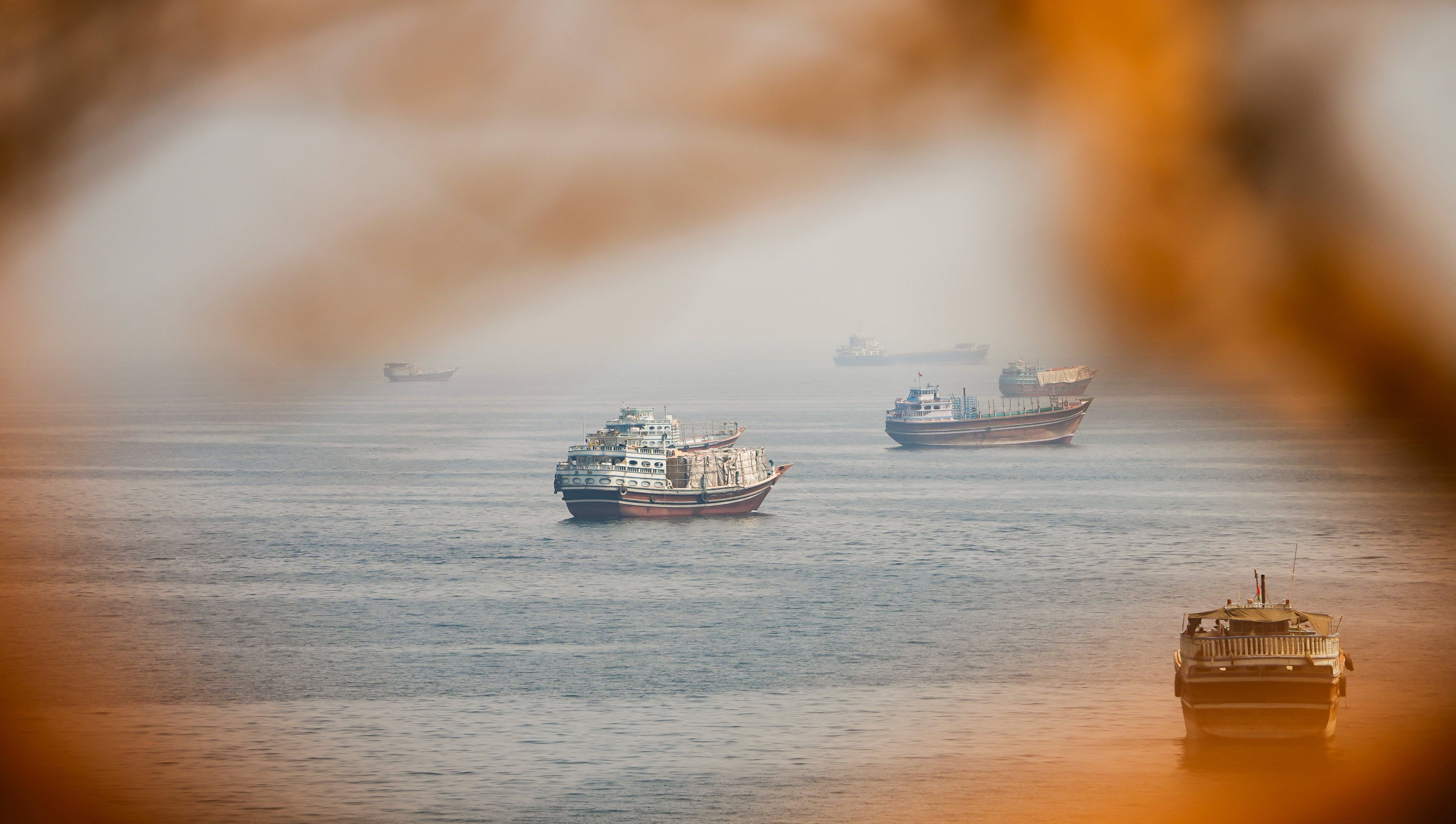 Vessels near the Strait of Hormuz, as seen from Musandam, Oman, on August 31. The US needs to find a way out of its Iran quagmire. Photo: Reuters