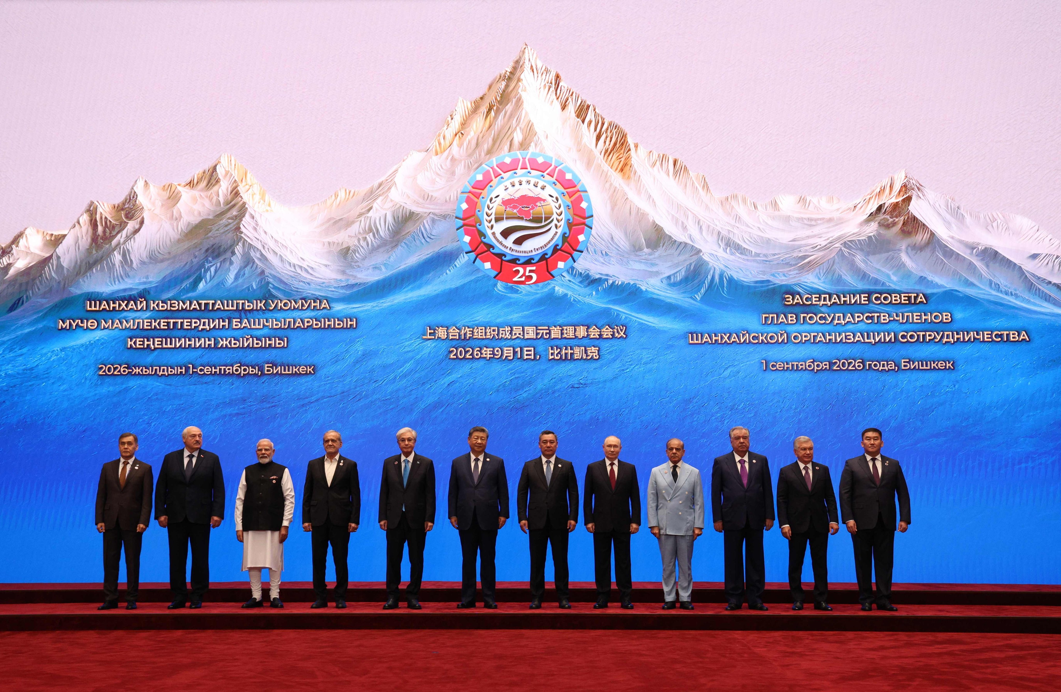 India’s Narendra Modi (third from left), China’s Xi Jinping (centre, left) and Russian President Vladimir Putin (fifth from right) stand with other leaders at the Shanghai Cooperation Organisation summit in Bishkek on Tuesday. Photo: AFP