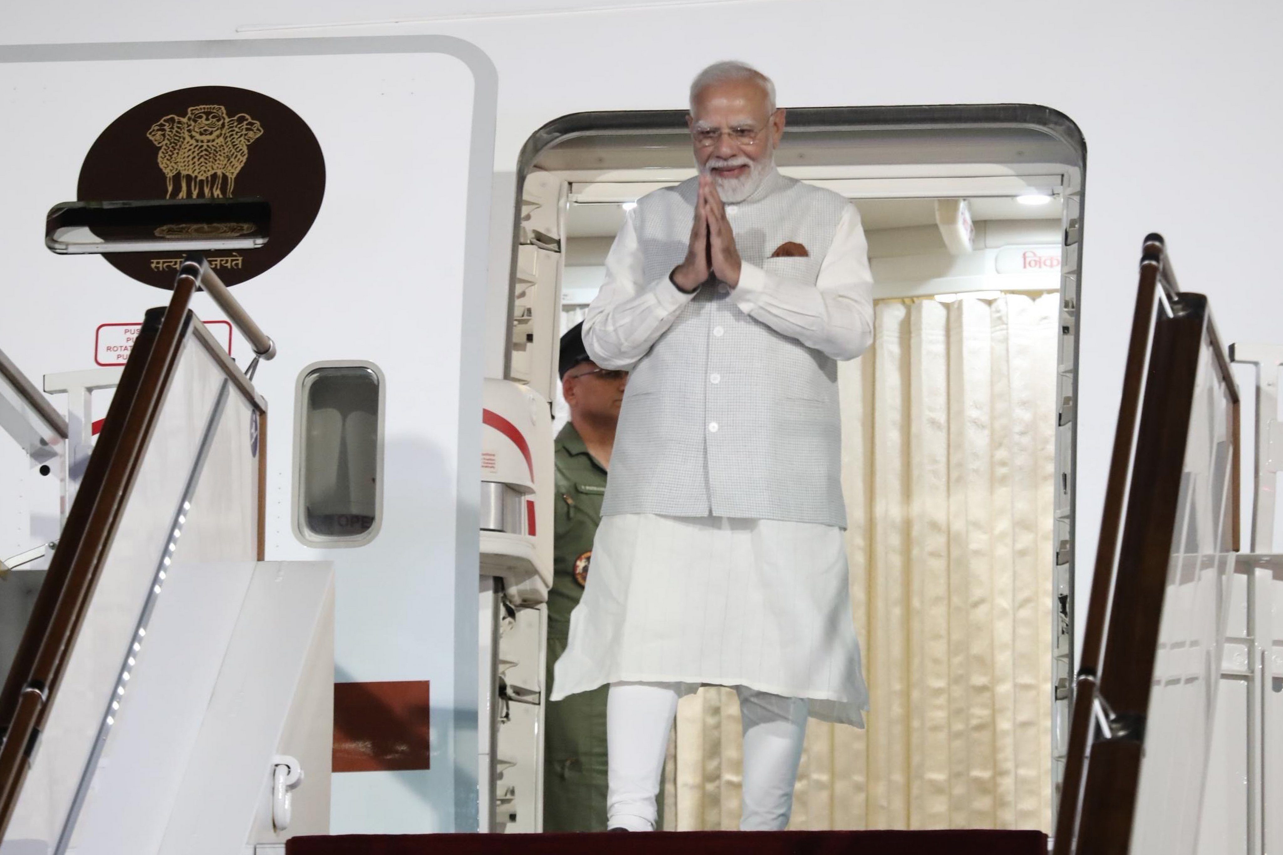 Indian Prime Minister Narendra Modi disembarks from an aircraft upon his arrival in Bishkek, Kyrgyzstan, on Sunday. Photo: Kyrgyzstan’s Presidential Press Office / AP