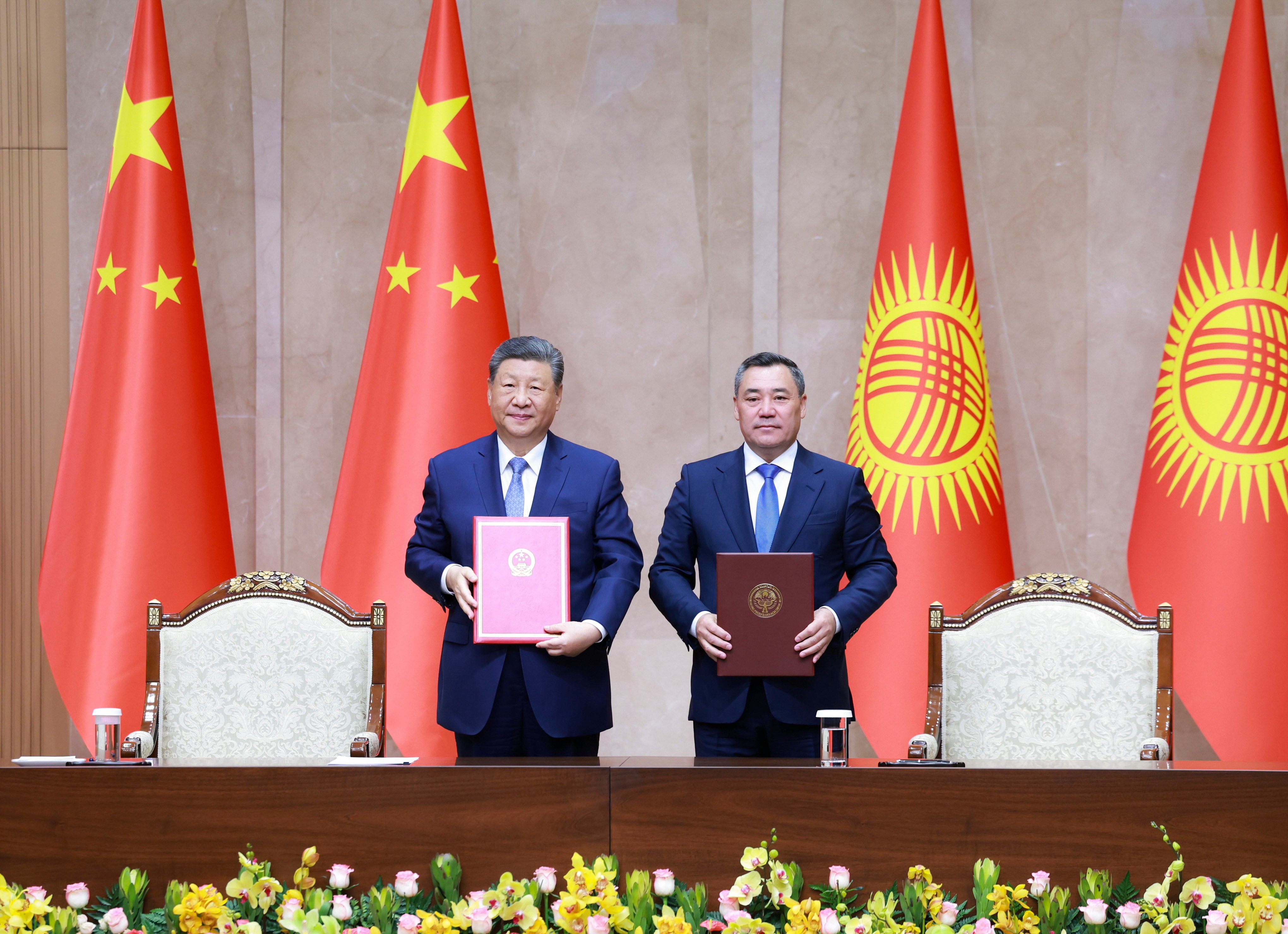 President Xi Jinping and Kyrgyz counterpart Sadyr Japarov sign a joint declaration on the development of the China-Kyrgyzstan partnership on Monday. Photo: Xinhua