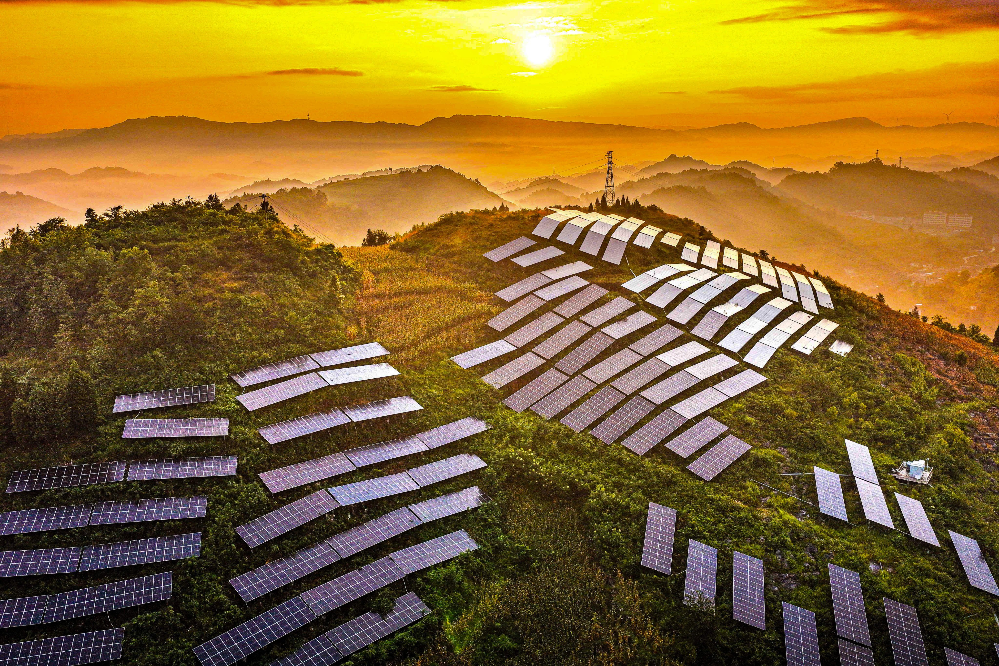 Solar panels on a hillside at an agricultural photovoltaic power station in Qianxi city, southwestern China’s Guizhou province, on August 17. Photo: AFP