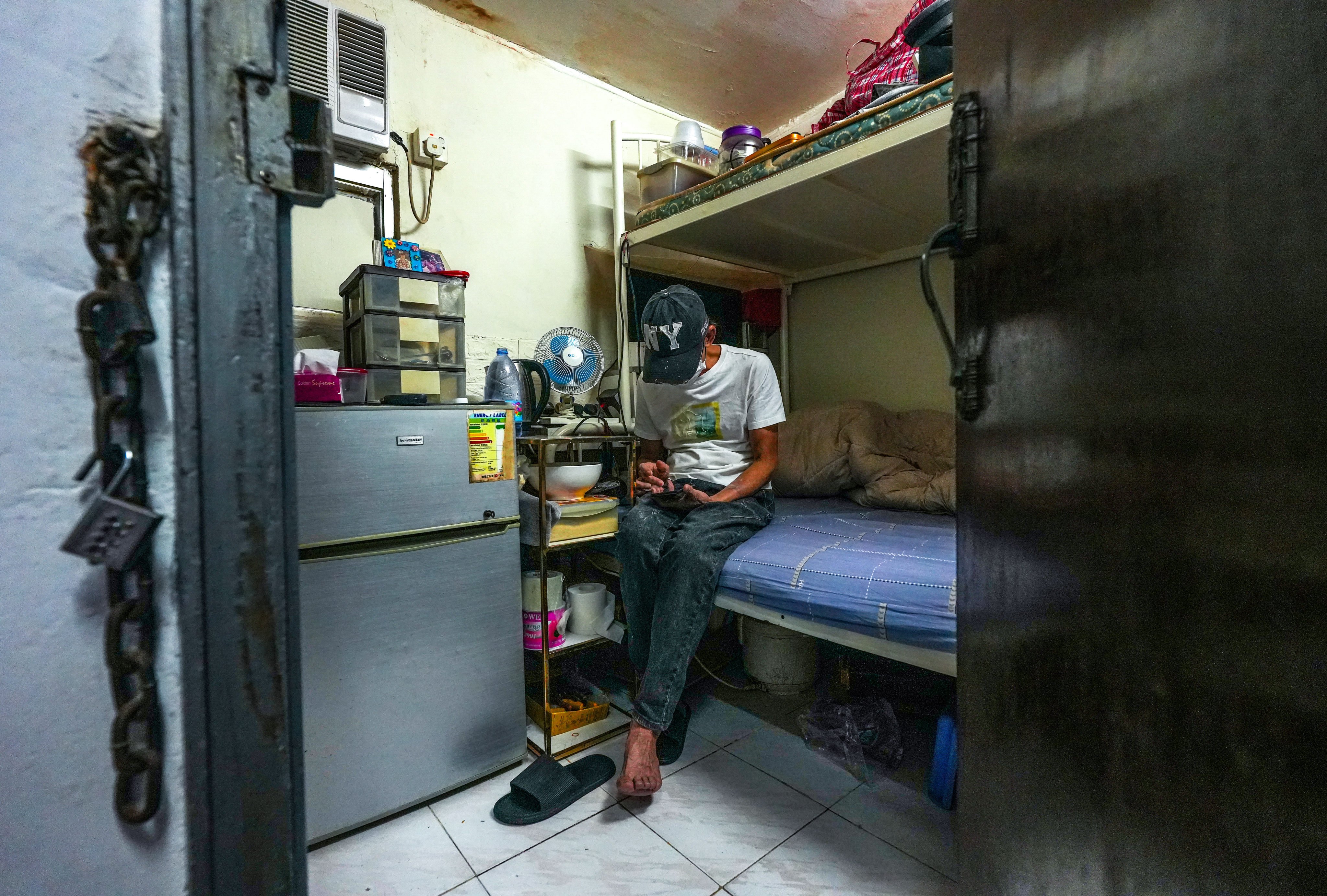 Subdivided flat resident Mr Cheung at his home in Sham Shui Po. Photo: Sun Yeung