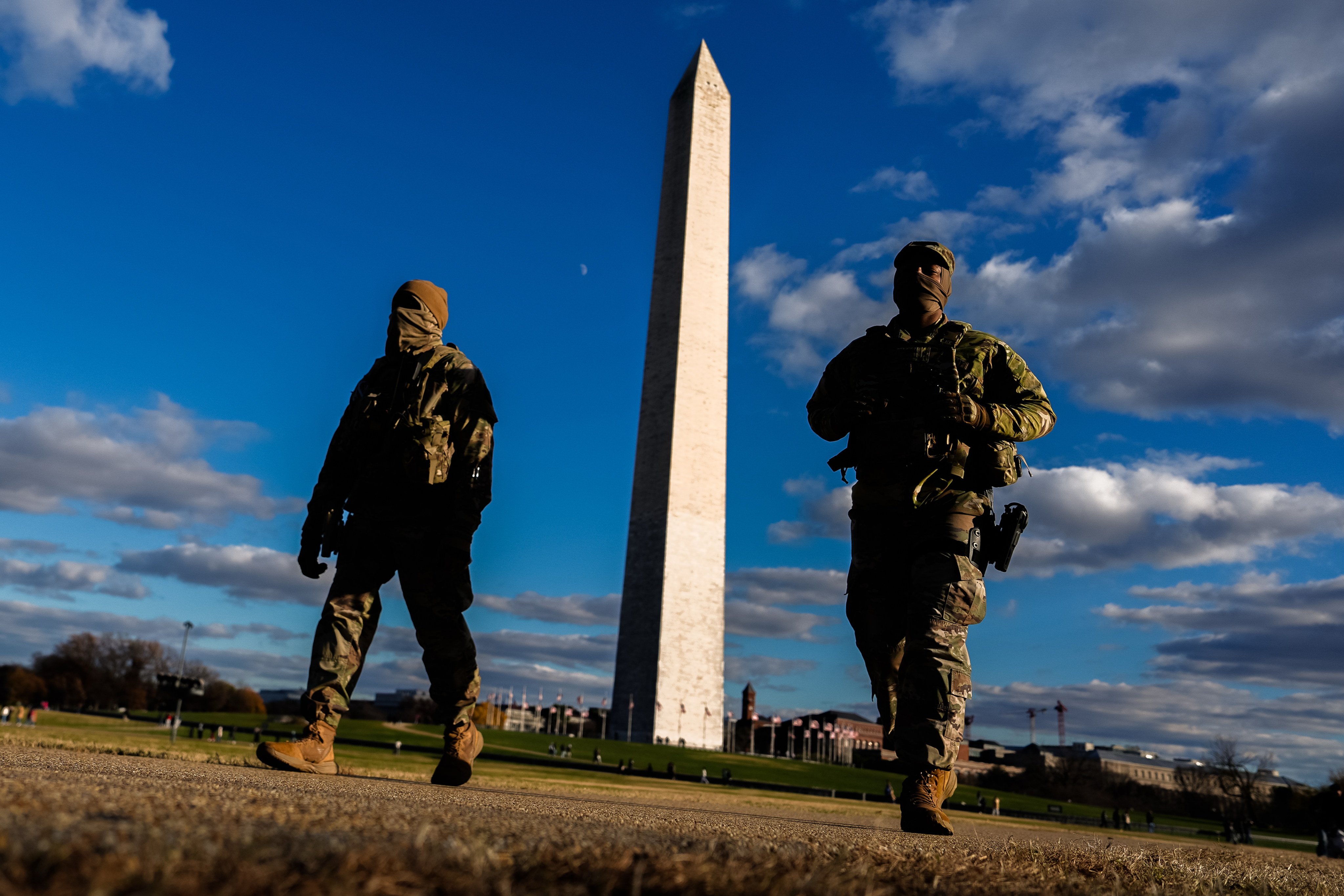 National Guard members patrol near the Washington Monument on November 28, 2025, two days after two troops were shot near the White House. Photo: AP