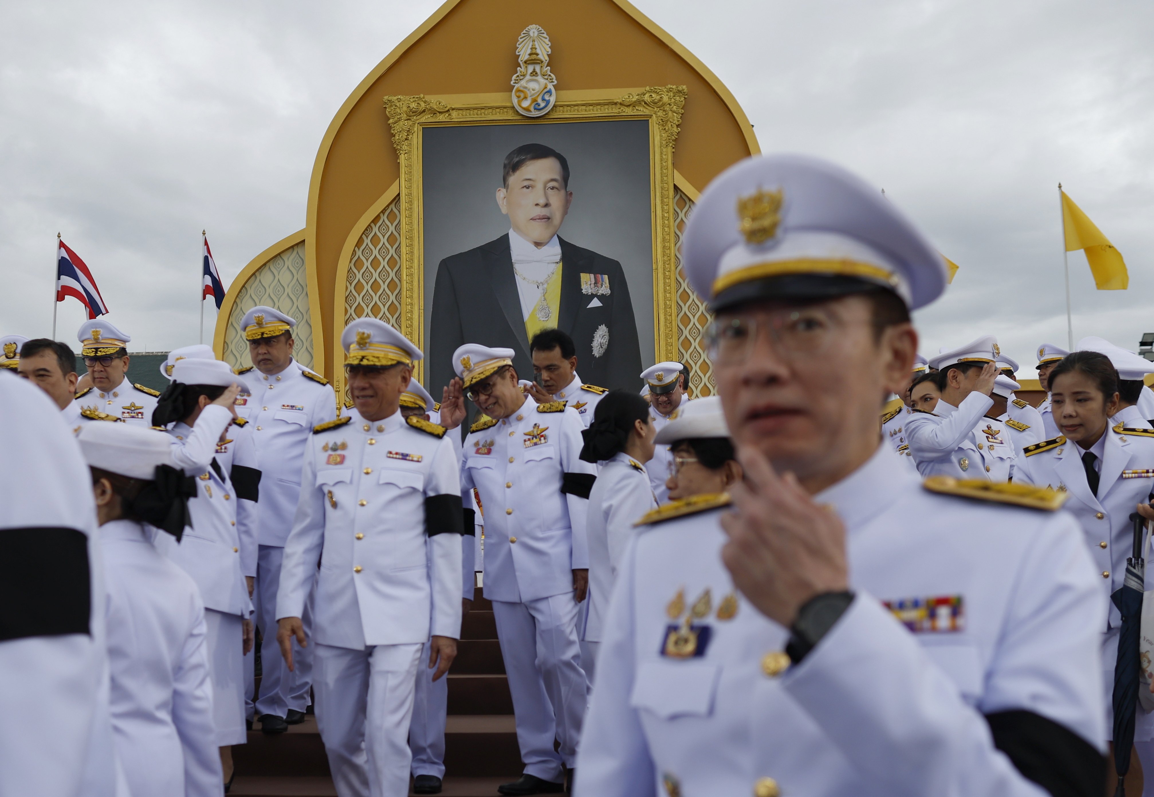 Thai officials leave after taking the oath of allegiance to become lawful civil servants to mark Thai King Maha Vajiralongkorn’s 74th birthday at Sanam Luang outside the Grand Palace in Bangkok on July 28. Photo: EPA