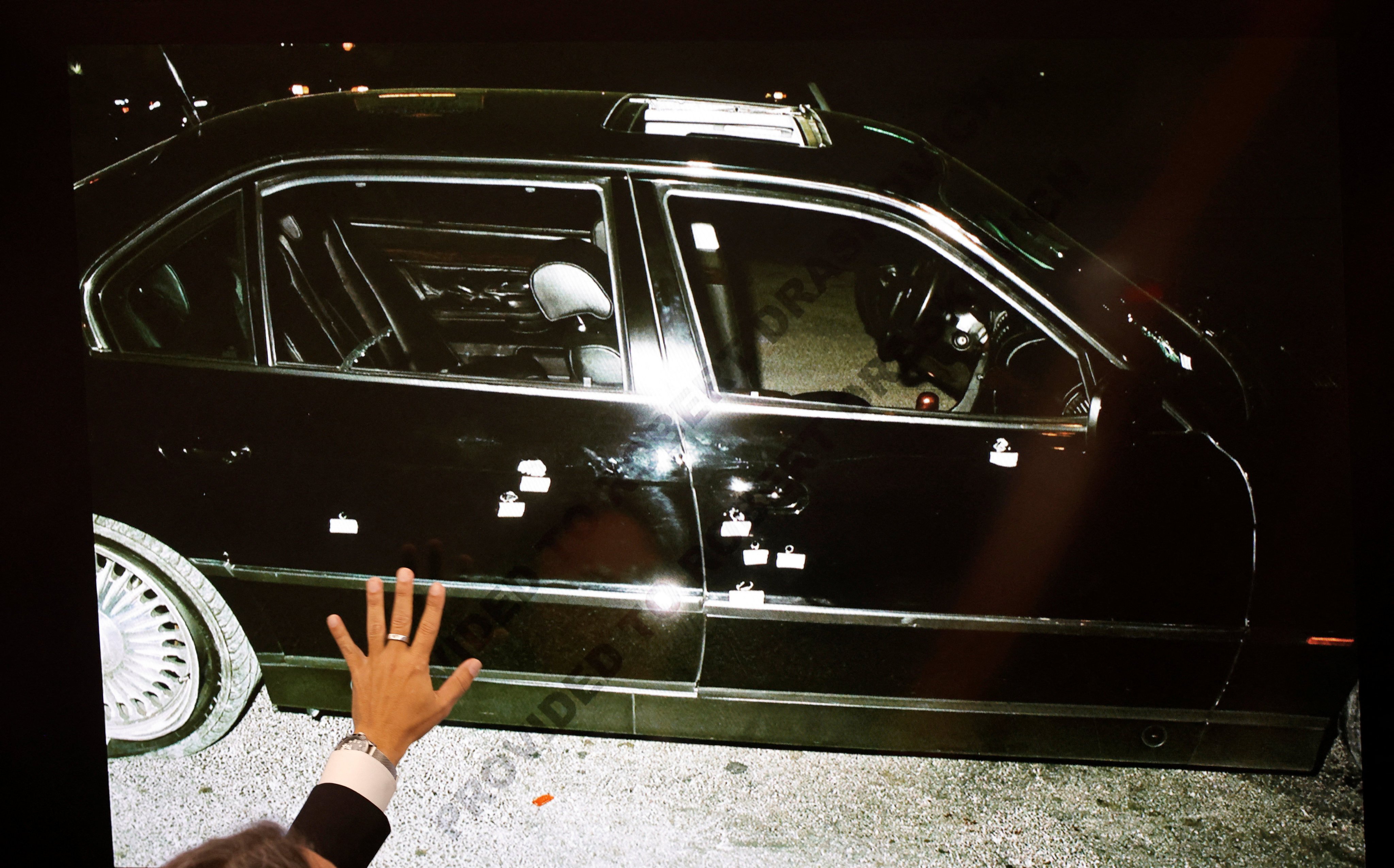 A 1996 photo of the bullet-ridden black BMW that Marion 'Suge' Knight and Tupac Shakur were riding in. Photo: Reuters
