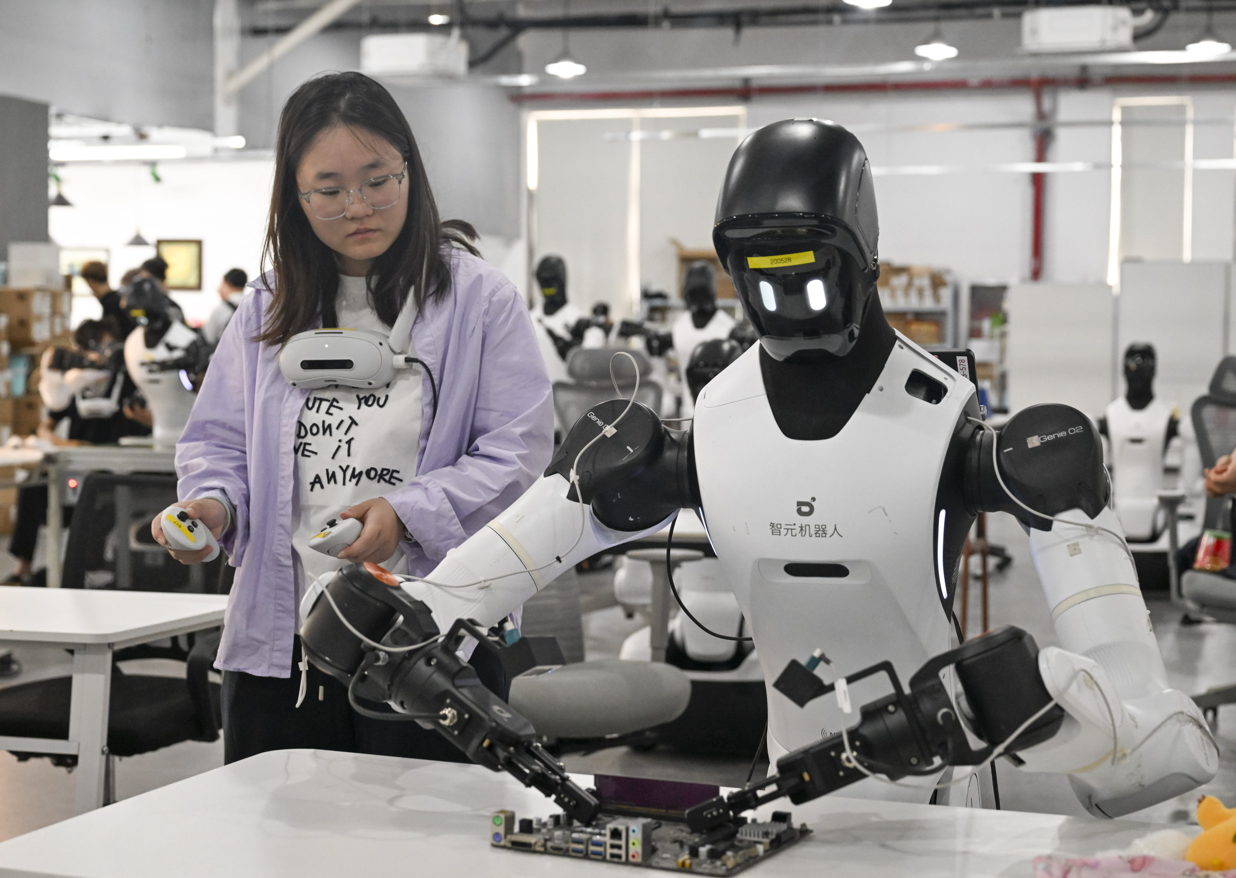 An AgiBot robot undergoes training in Shanghai. The company is among tech firms that have signed memorandums of understanding with HKU. Photo: Xinhua