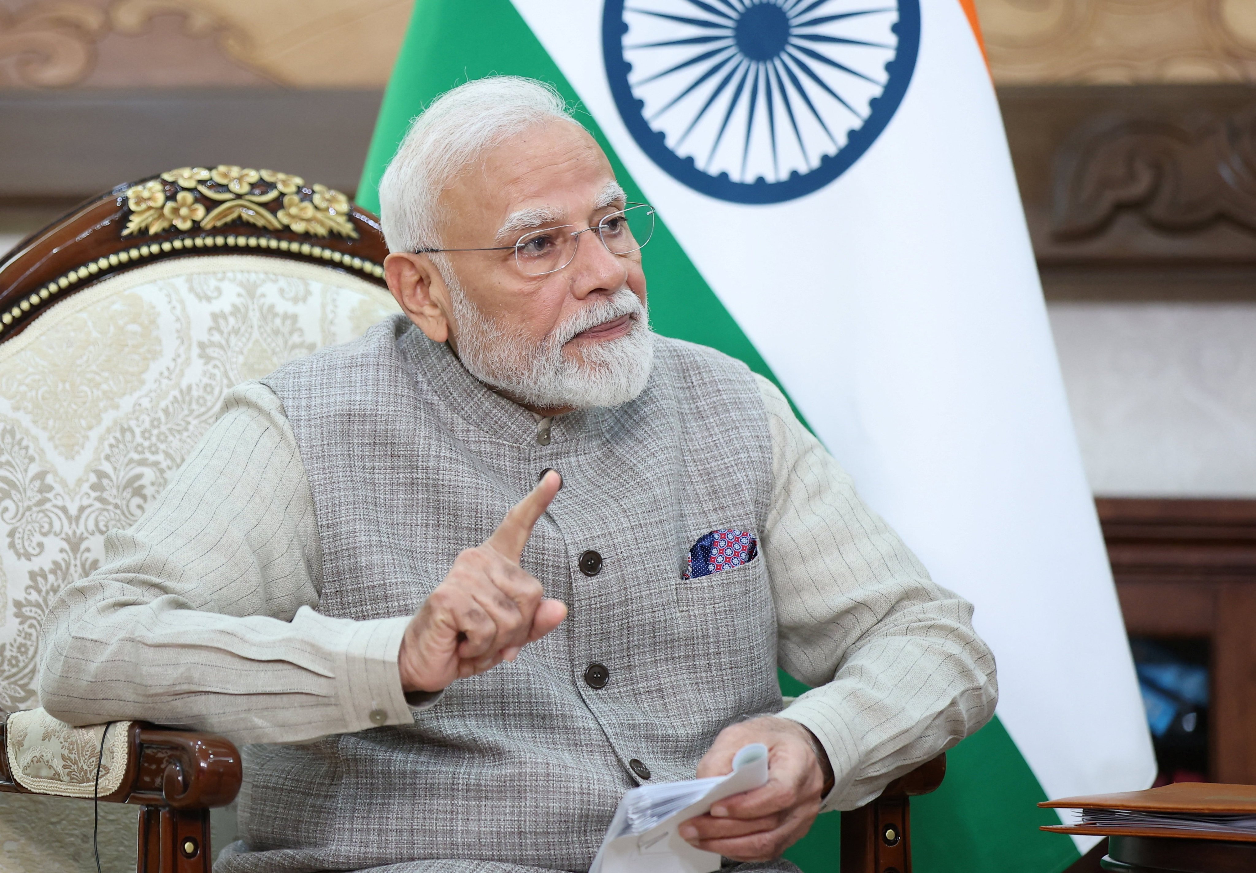 Indian Prime Minister Narendra Modi gestures during a meeting on the sidelines of the Shanghai Cooperation Organisation summit in Bishkek on Monday. Photo: Sputnik / Reuters