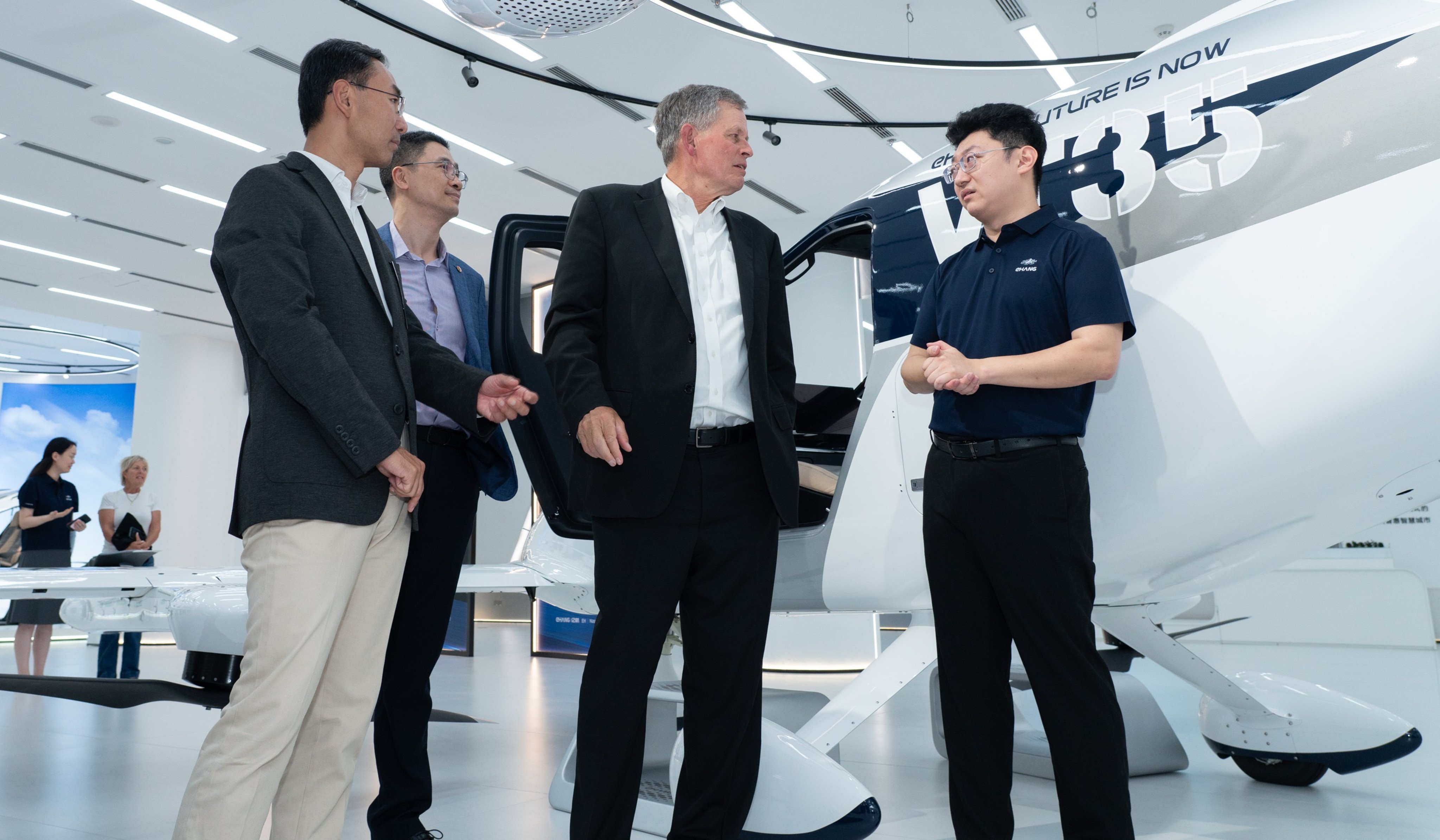 US Senator Steve Daines (centre) visits to the headquarters of EHang, a Chinese manufacturer of autonomous electric vertical take-off and landing aircraft, in Guangzhou on Saturday. Photo: Handout