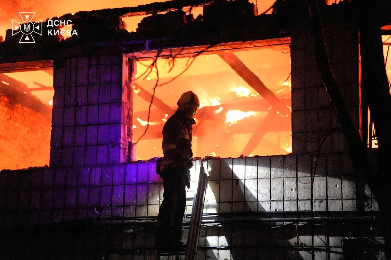 A firefighter at the site of Russian missile attack. Photo: State Emergency Service of Ukraine in Kyiv via Reuters