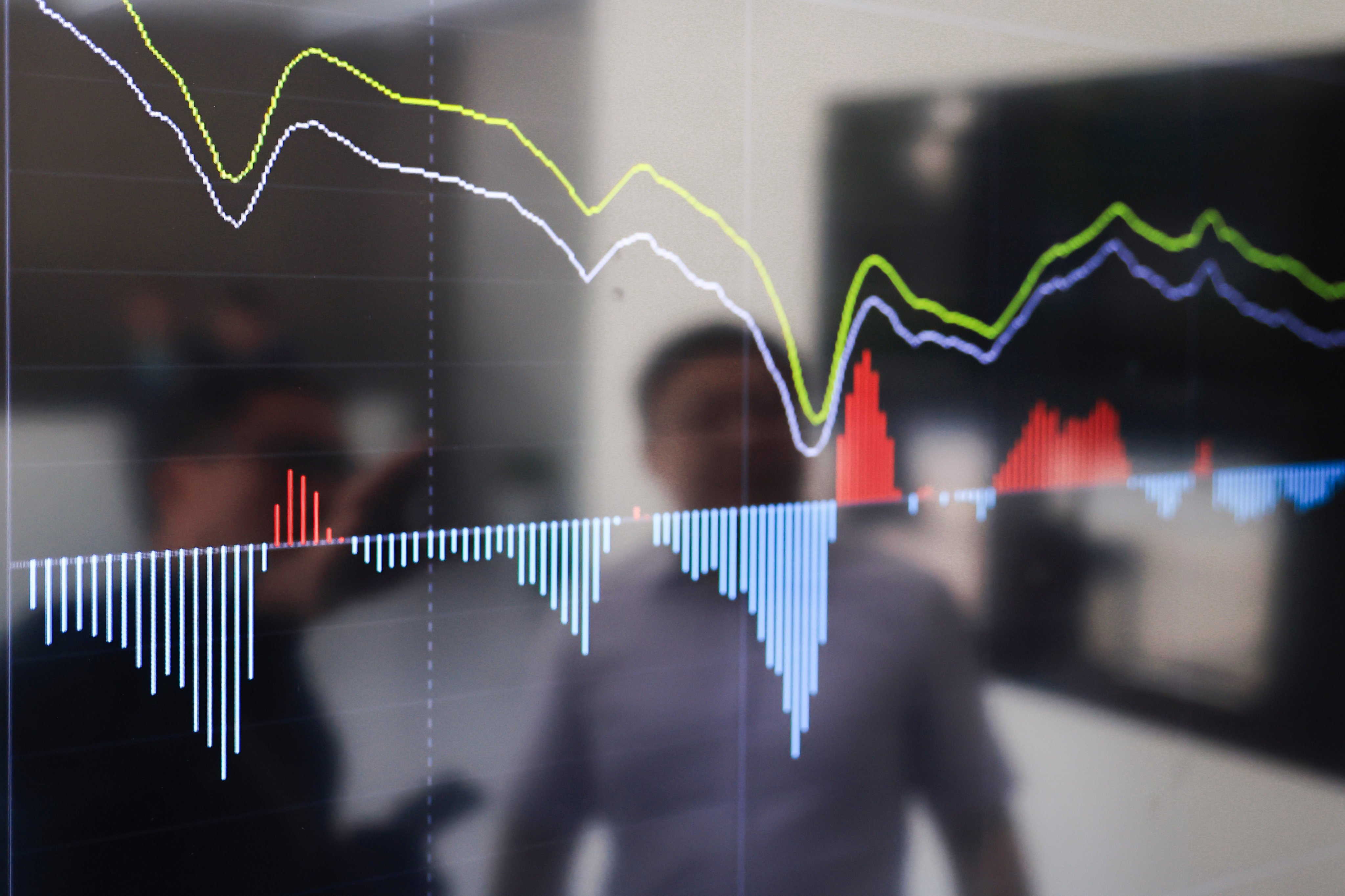Investors check out stock market data in Nanjing, Jiangsu province. Photo: Getty Images