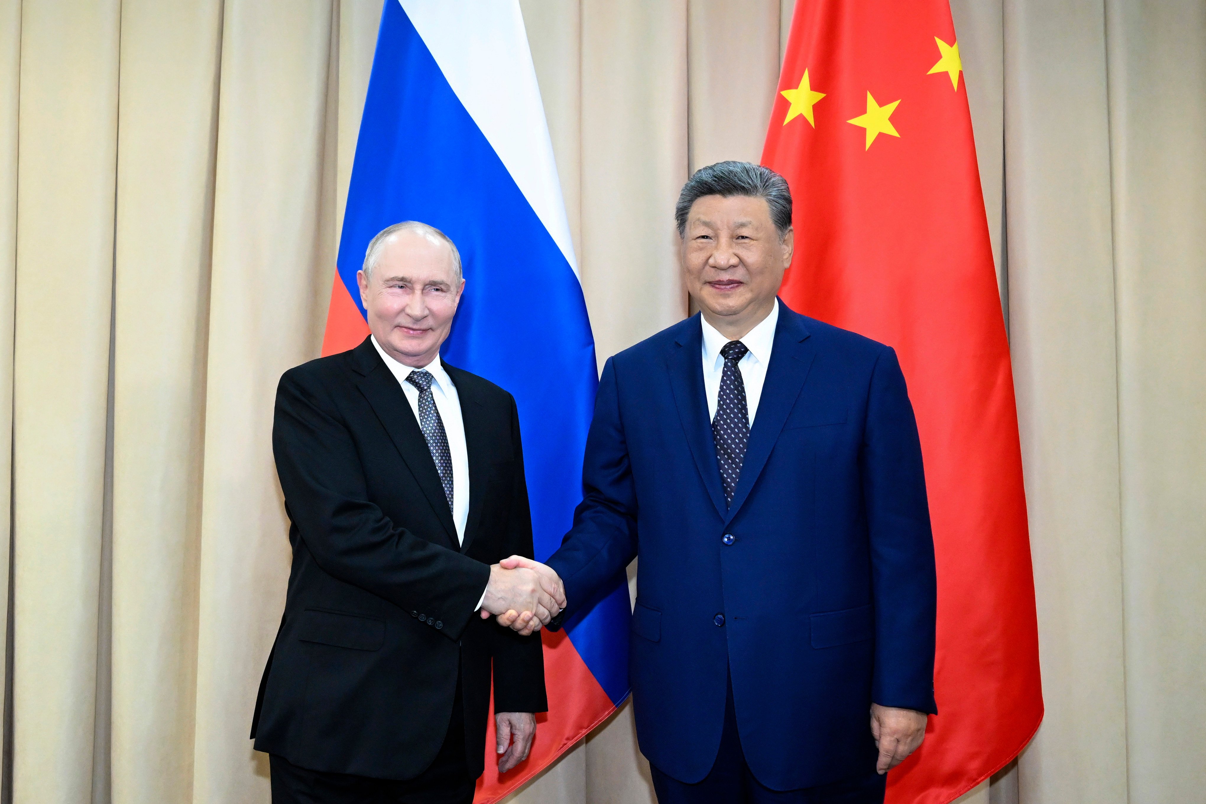 Russian President Vladimir Putin and Chinese President Xi Jinping meet on the sidelines of the Shanghai Cooperation Organisation summit in Bishkek, Kyrgyzstan, on Monday. Photo: Xinhua via AP