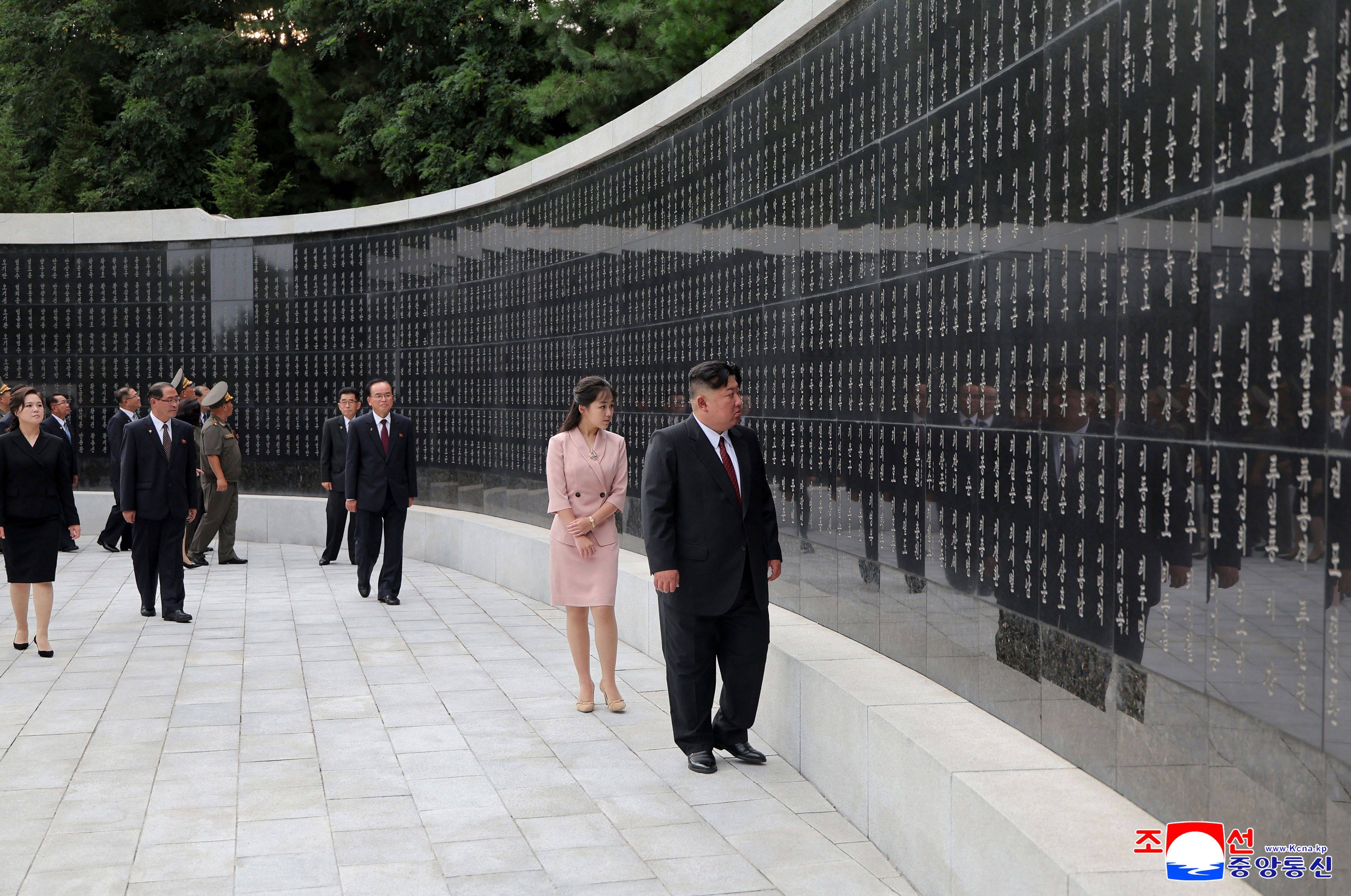 Kim Jong-un and Kim Ju-ae visit the Monument to the Anti-Japanese Revolutionary Martyrs in Pyongyang on August 15. Photo: KCNA / AFP