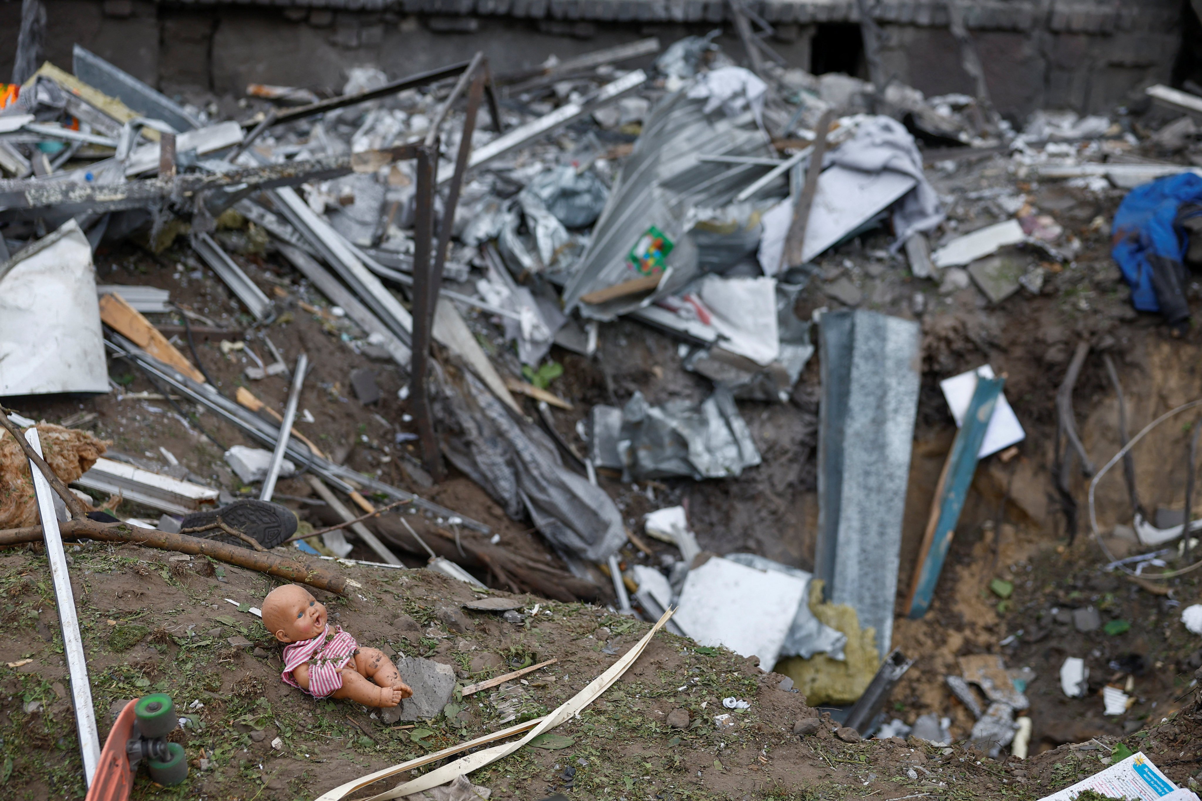 A toy next to a crater in the town of Boryspil, Kyiv region. Photo: Reuters