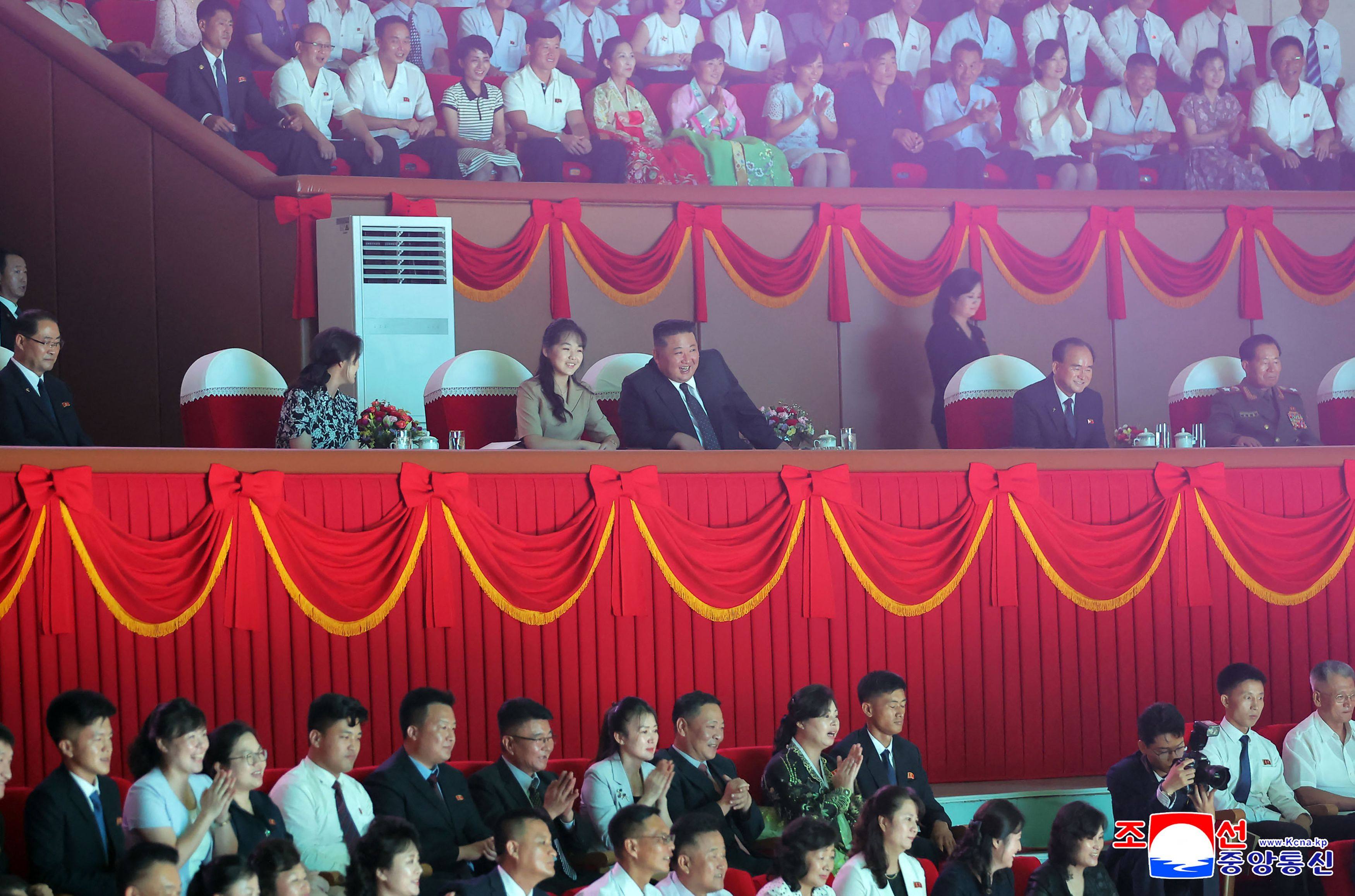 Kim Jong-un and his daughter Kim Ju-ae watch performances on August 16 to mark the 81st anniversary of the end of World War II. Photo: KCNA / KNS / AFP