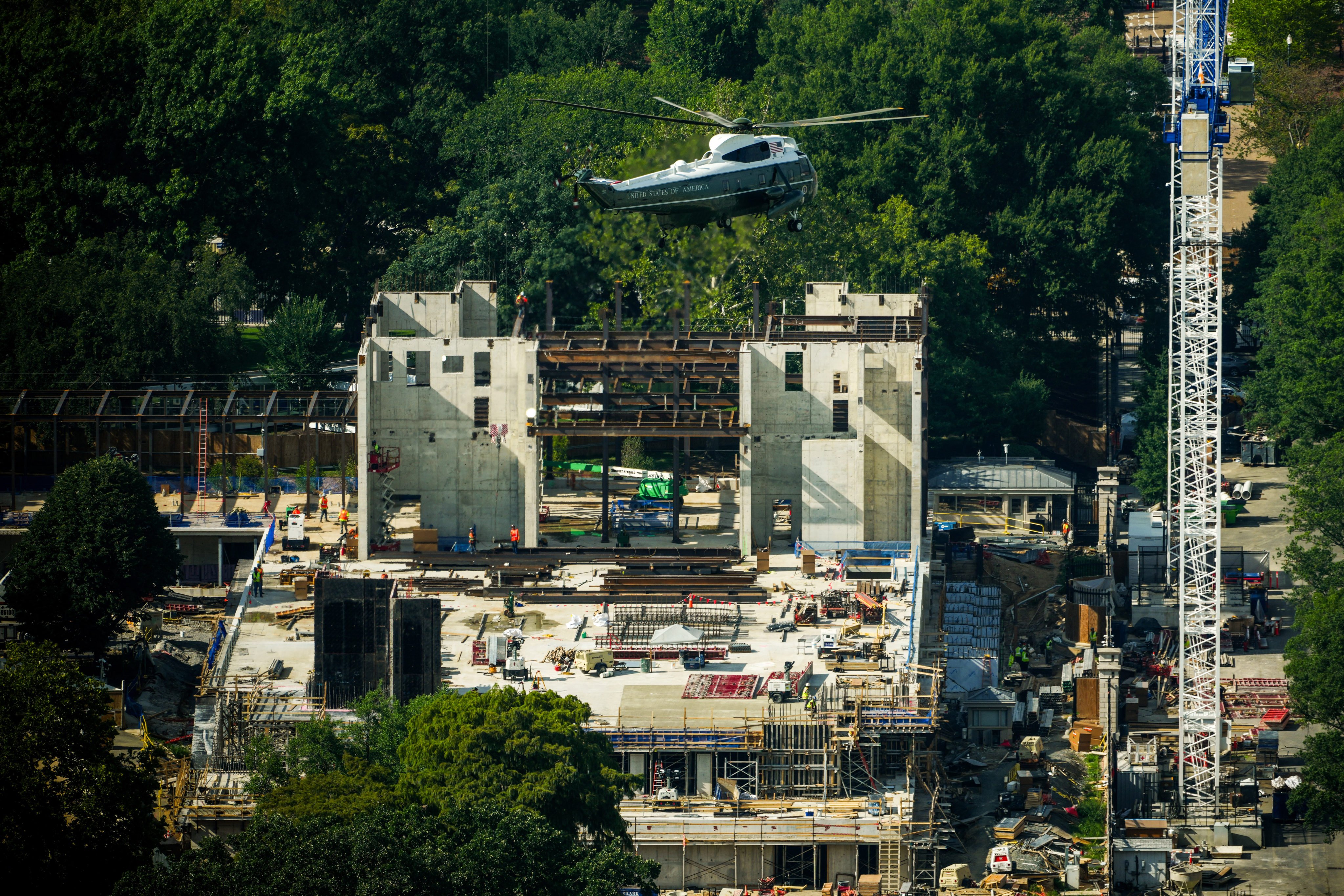 Marine One carrying US President Donald Trump passes over construction on the new White House ballroom. Photo: AP