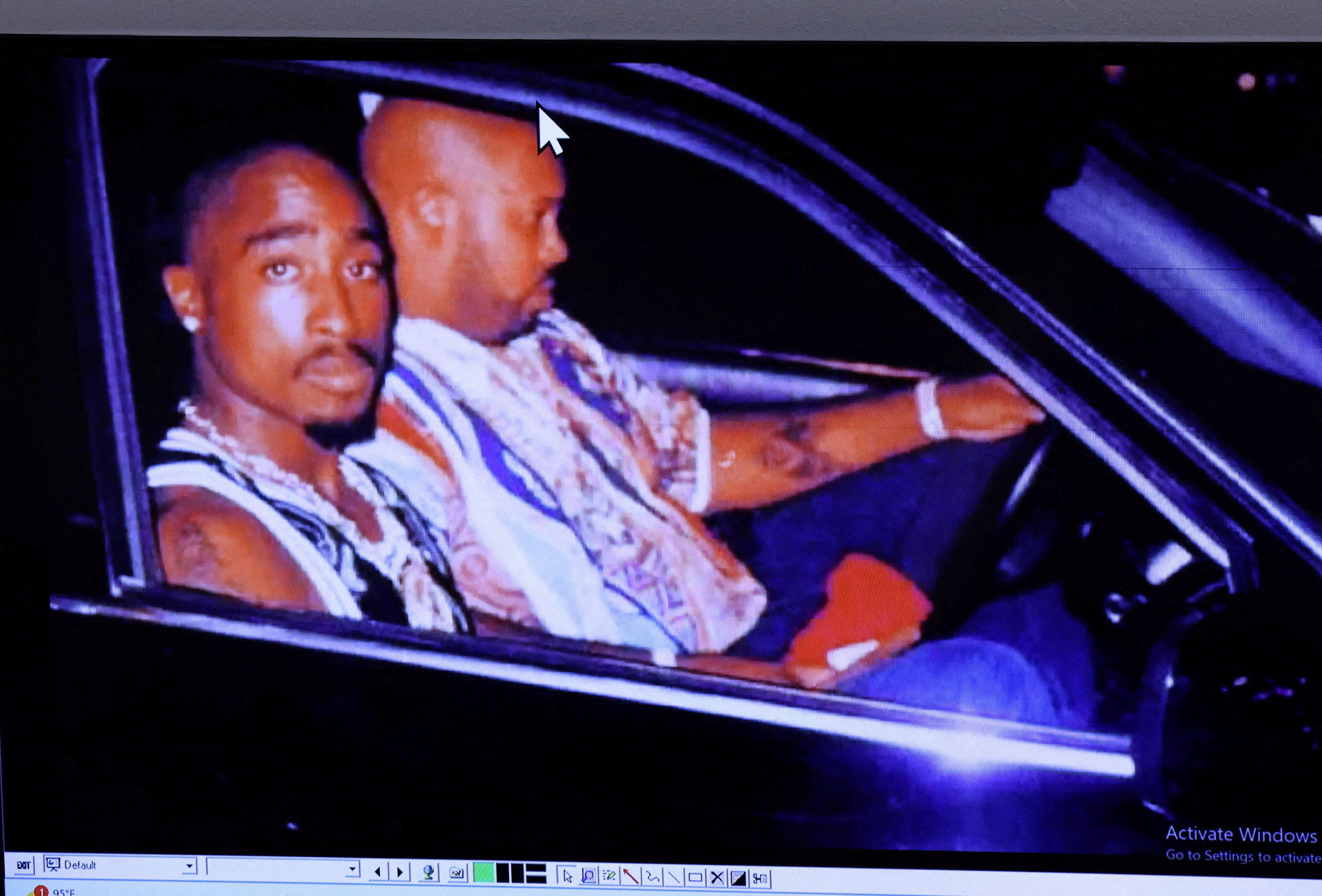 A photograph of rapper Tupac Shakur and Marion ‘Suge’ Knight, right, taken by Leonard Jefferson, just minutes before the fatal shooting in 1996, is displayed during the murder trial of Duane Davis. Photo: Reuters