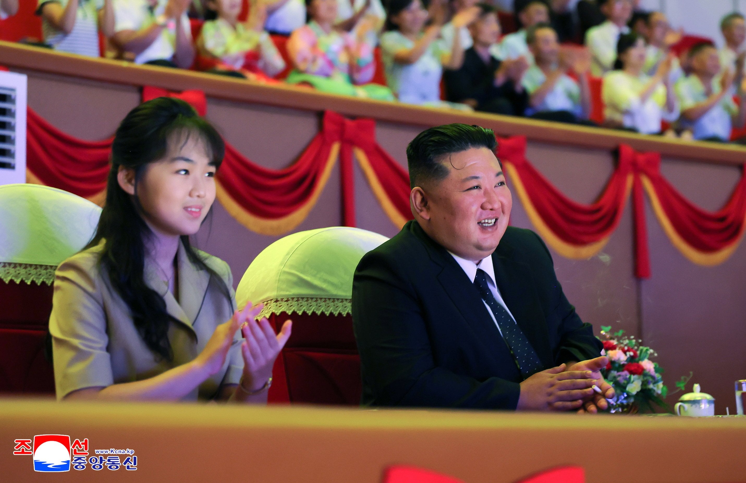 Kim Ju-ae appears with her father, North Korean leader Kim Jong-un, at a circus performance in Pyongyang on August 16. Photo: KCNA/EPA