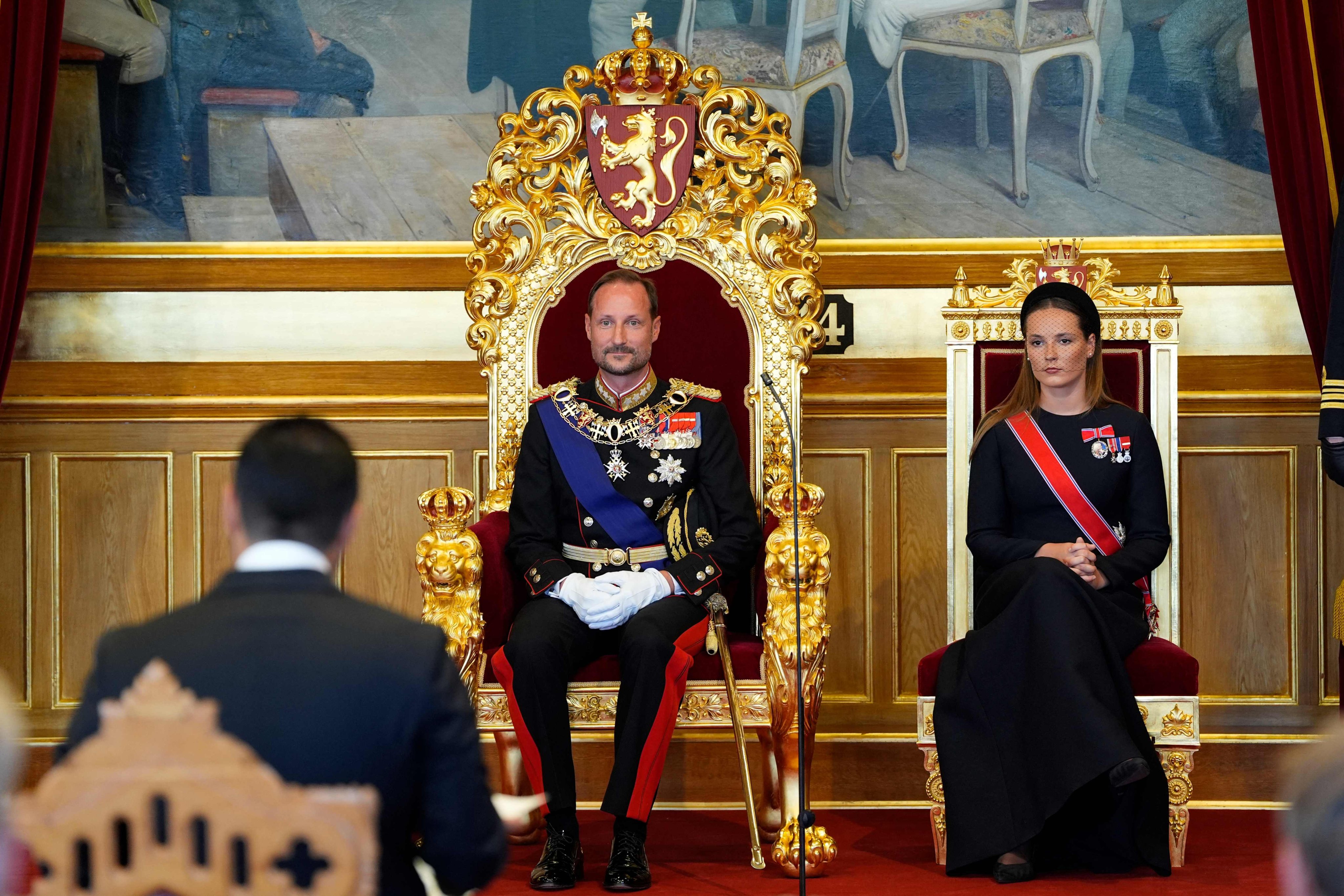Crown Princess Ingrid Alexandra (right) sits next to her father King Haakon VIII during an oath-taking ceremony for the new king to Norway’s constitution in the main chamber of the Norwegian parliament in Oslo on Tuesday. Photo: AFP