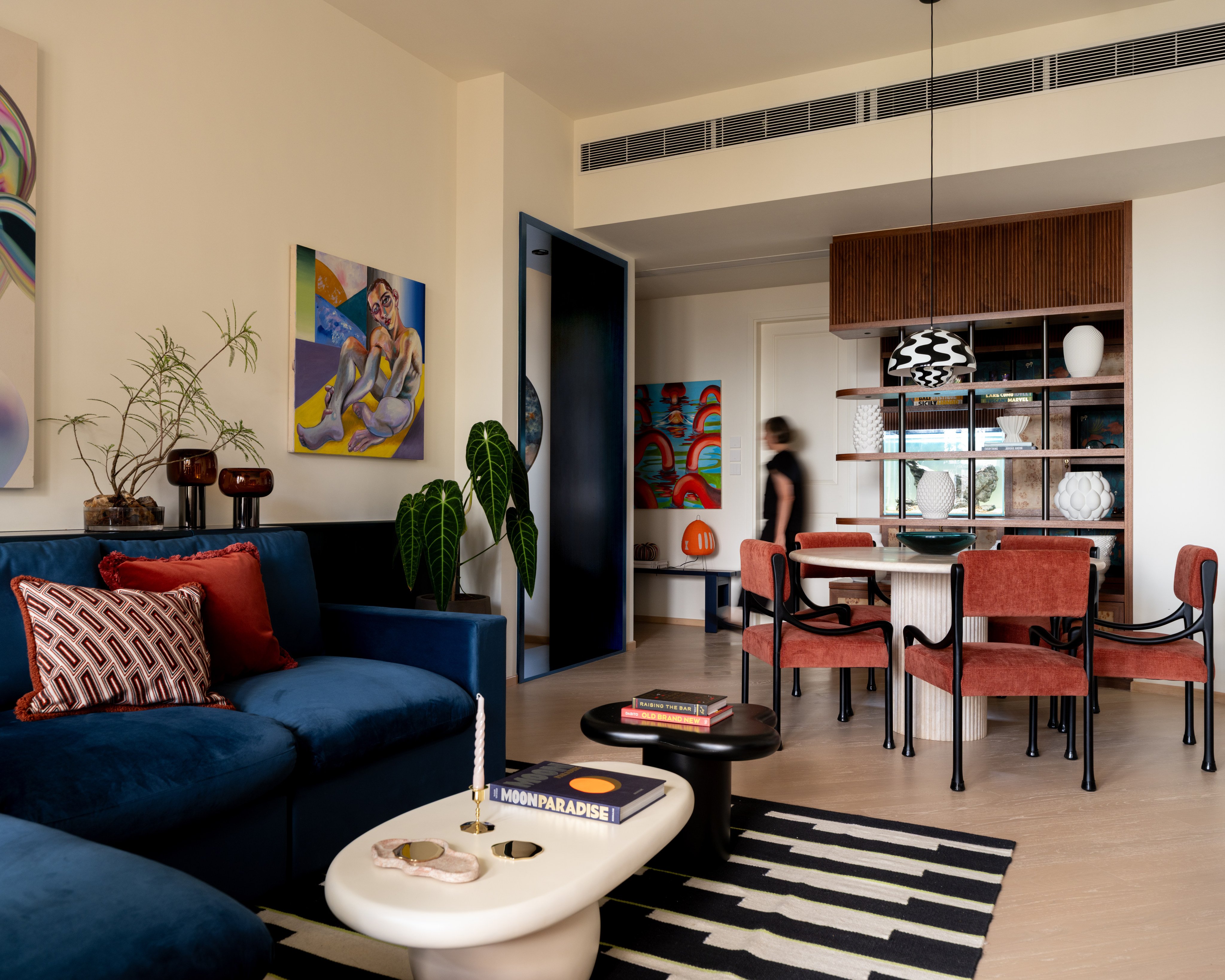 After a feng shui master declared the Ho Man Tin flat's front door sat in the wrong place, interior designer Quinn Wong created a partition wall facing the front door to carve out a small transitional hallway. Photo: Common Studio. Styling: Esther Van Wijck