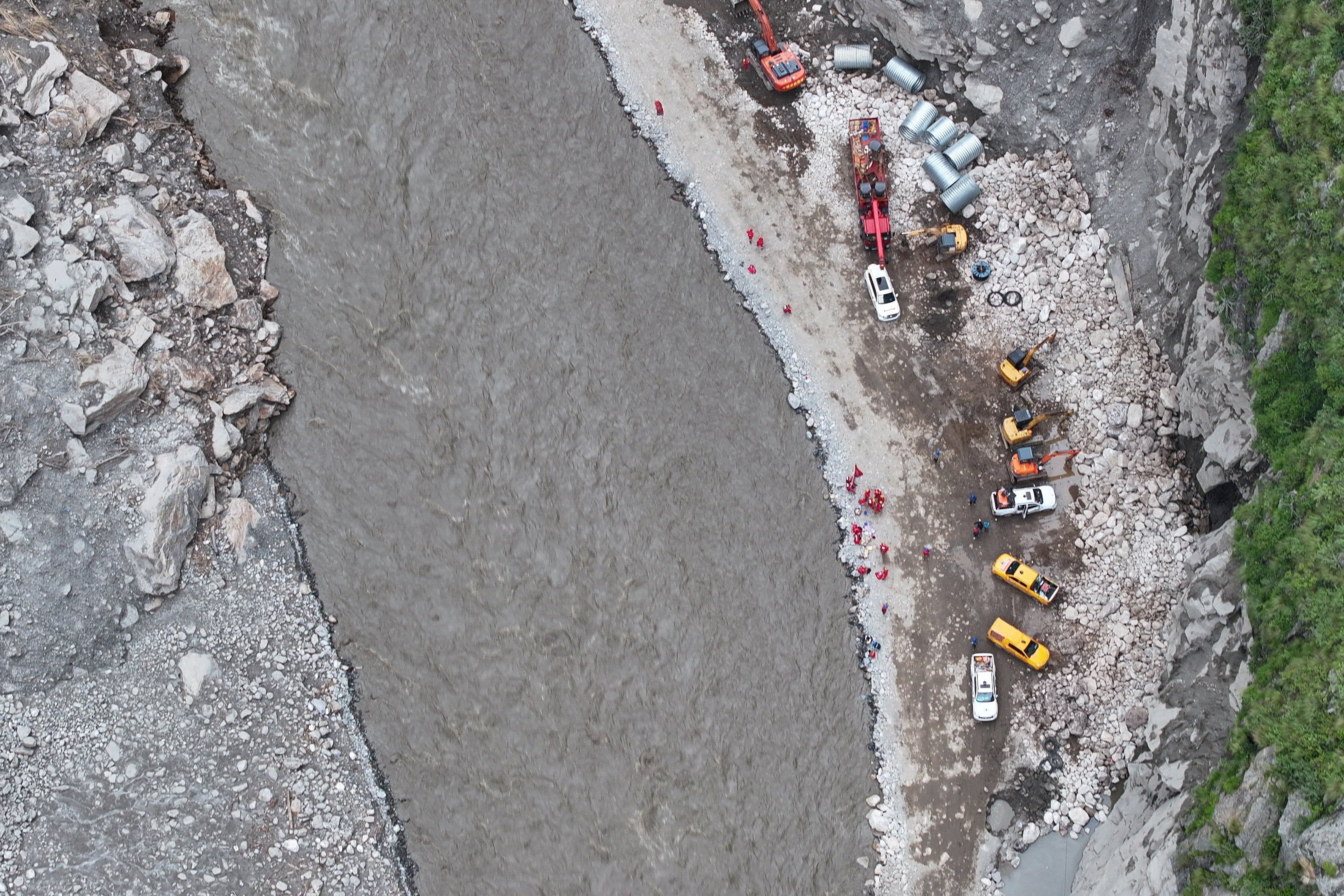 A drone view shows excavators and rescue equipment at the core disaster-hit area at Gyirong Port following the August 26 mudslide in Shigatse, China’s Tibet autonomous region, on Tuesday. Photo: cnsphoto/Reuters