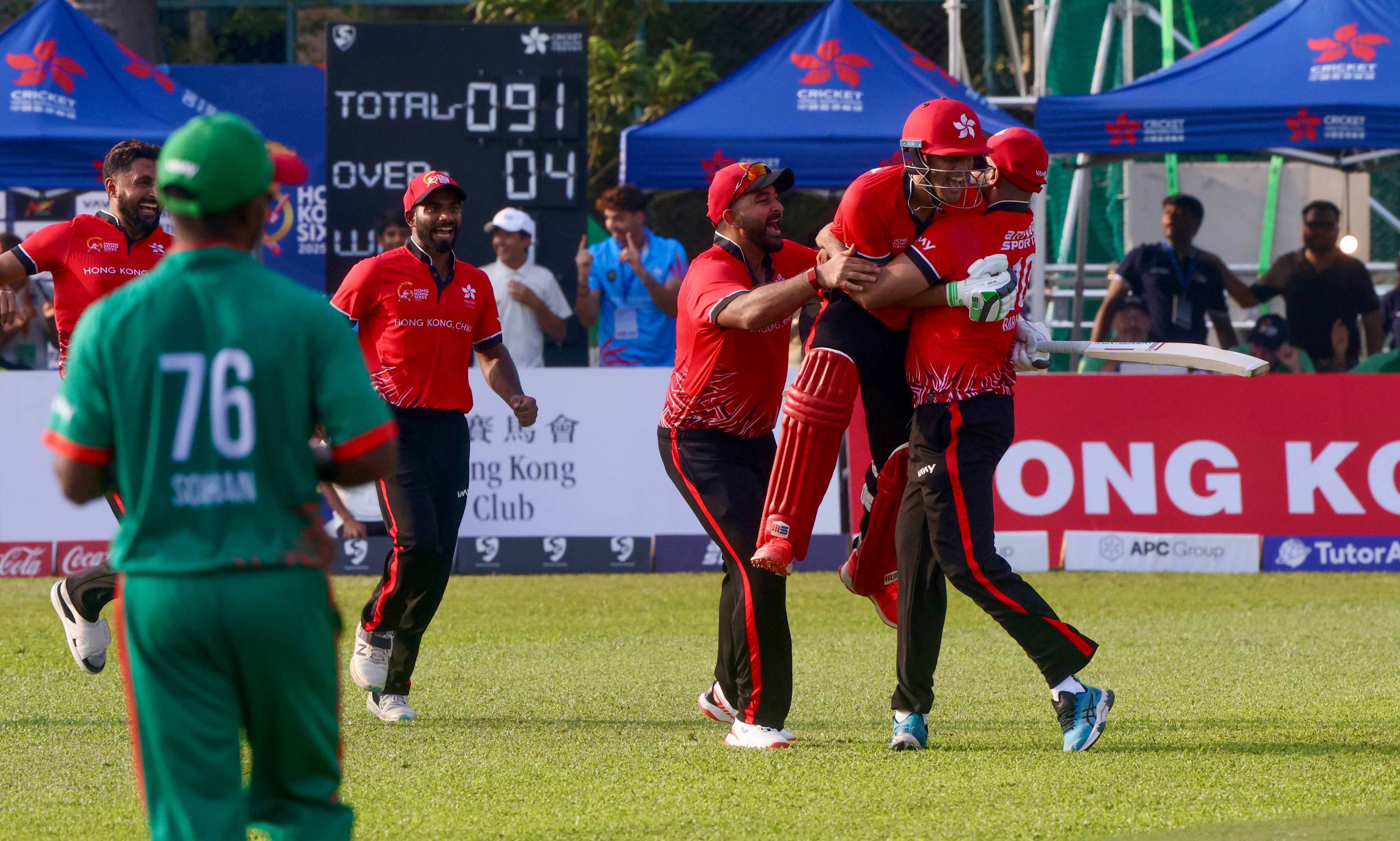 Hong Kong players celebrate after beating Bangladesh in the plate final at last year’s Sixes. Photo: Jonathan Wong