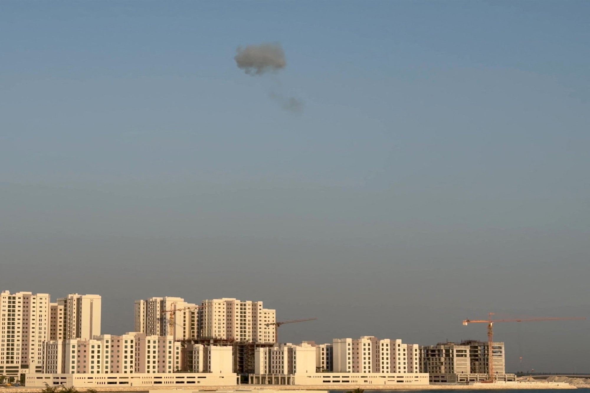 Smoke in the sky in northern Bahrain following Iranian drone and missile attacks. Photo: UGC via AFP Smoke in the sky in northern Bahrain following Iranian drone and missile attacks. Photo: UGC via AFP